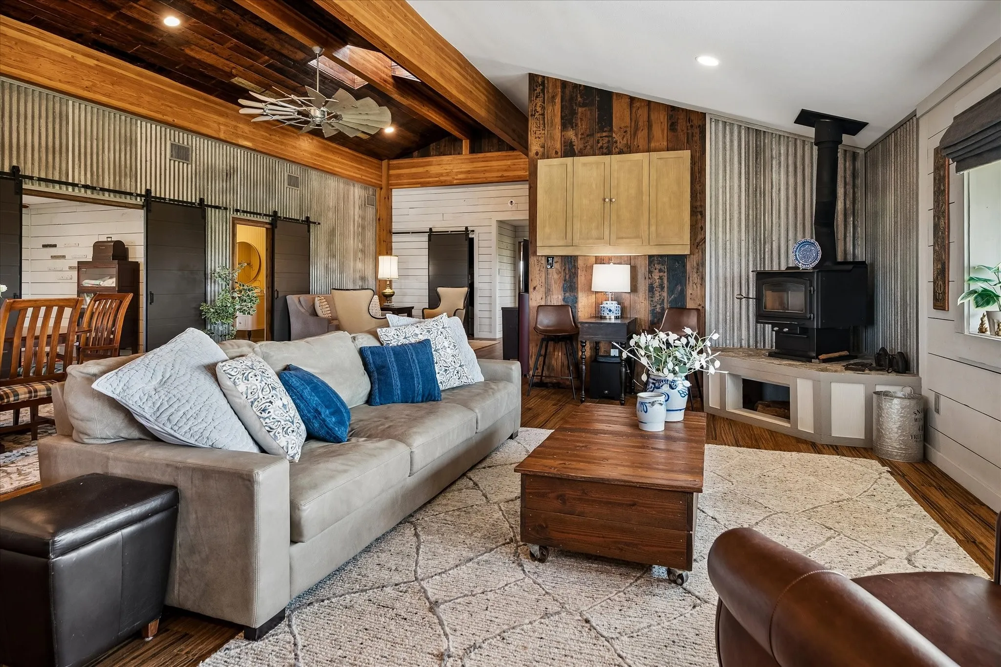 Wait until you see the views from these windows! Covered porch overlooking Lake Benbook in the distance, spectacular sunsets and beautiful views of the surrounding countryside. Wood stove for extra ambiance.