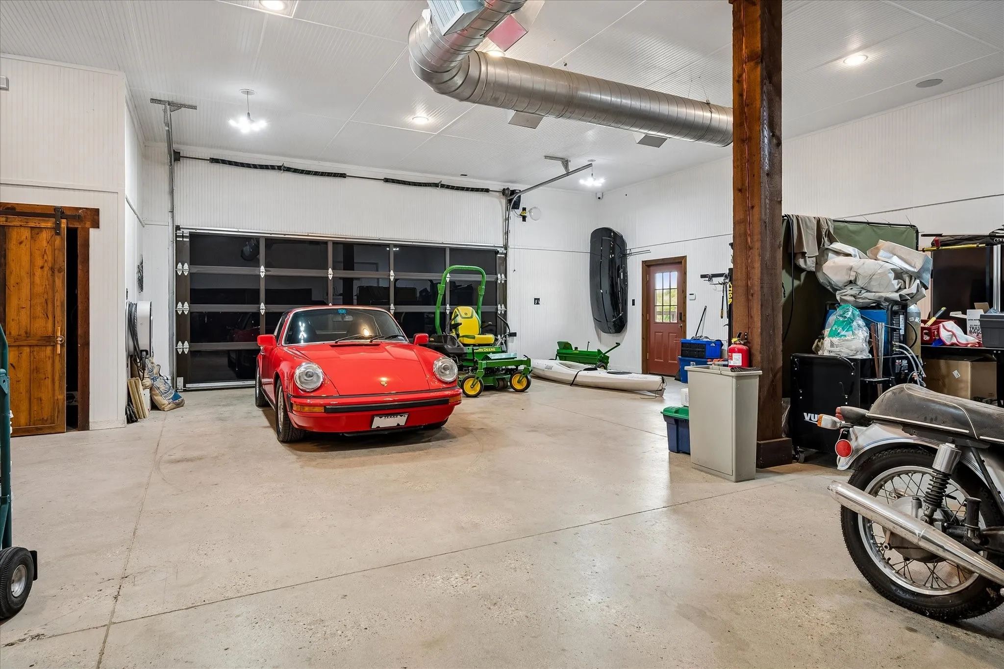 1400 square feet of climate controlled space with a plethora of uses. 220 car charger, industrial kitchen, Classic car storage and room for a workshop.