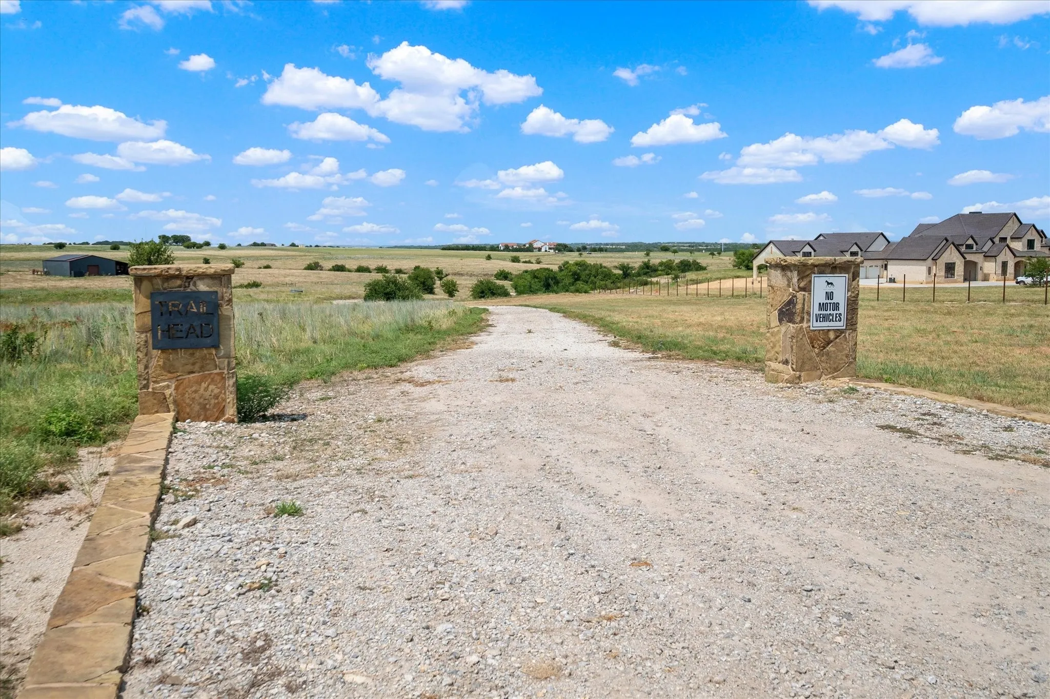 Tail head leading to 6 miles of private trails for hiking, biking and horseback riding.
