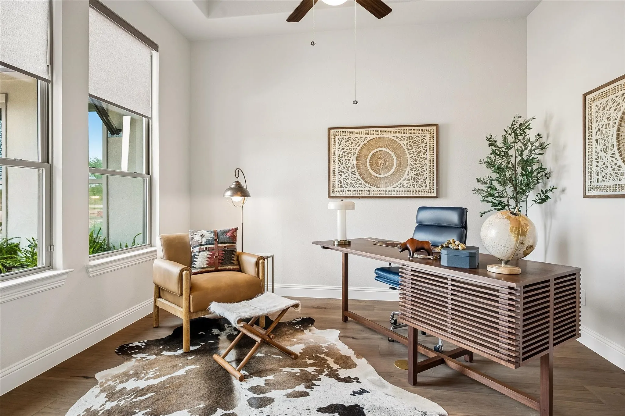 Office with French doors, ceiling fan and beautiful view of the front of the property.
