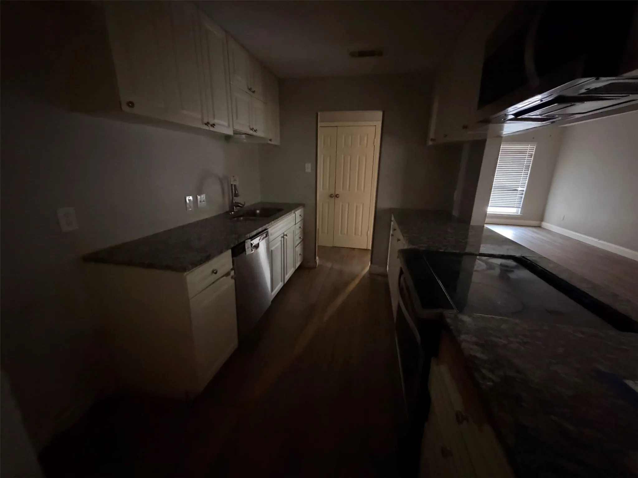 Kitchen with granite couters.