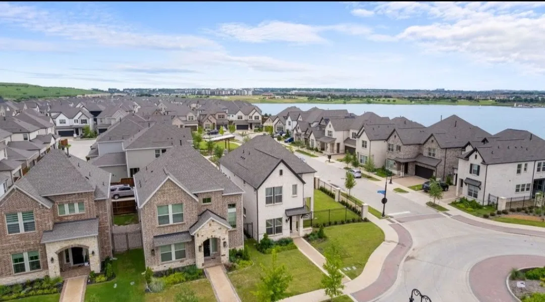 Homes featuring varied architectural styles and exterior finishes, with an established street grid and mature landscaping