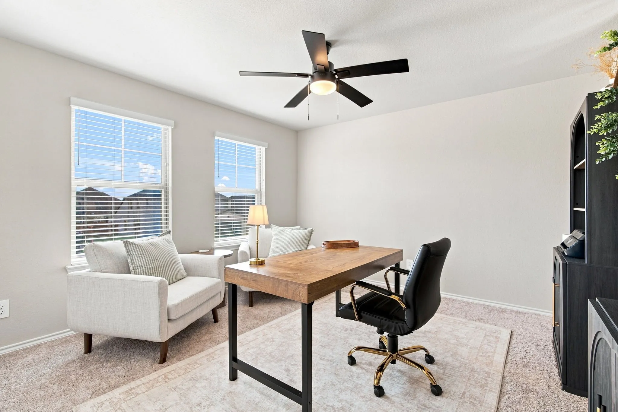 upstairs flex room with a closet. Being used as an office.