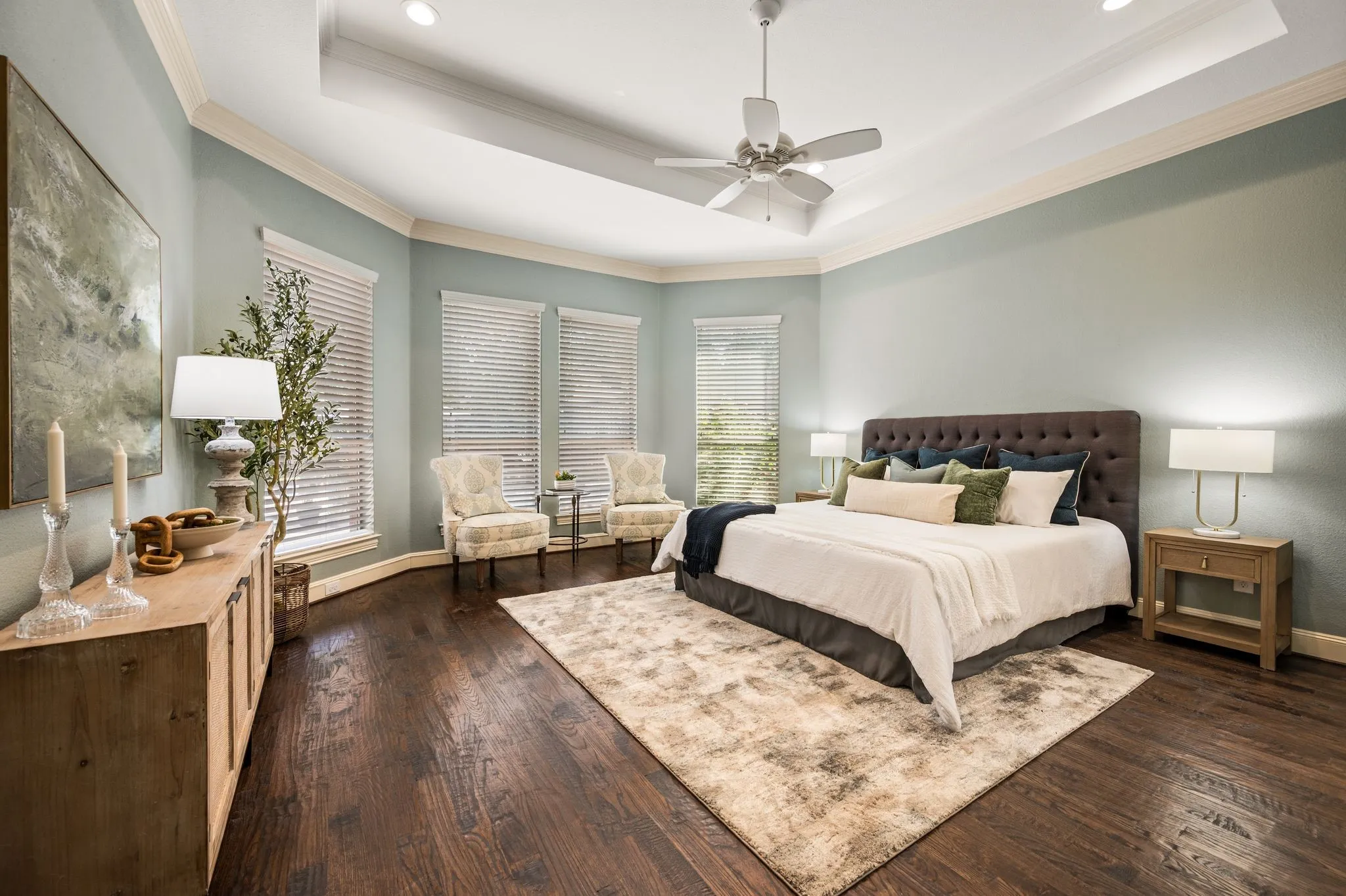 Primary bedroom overlooking pool