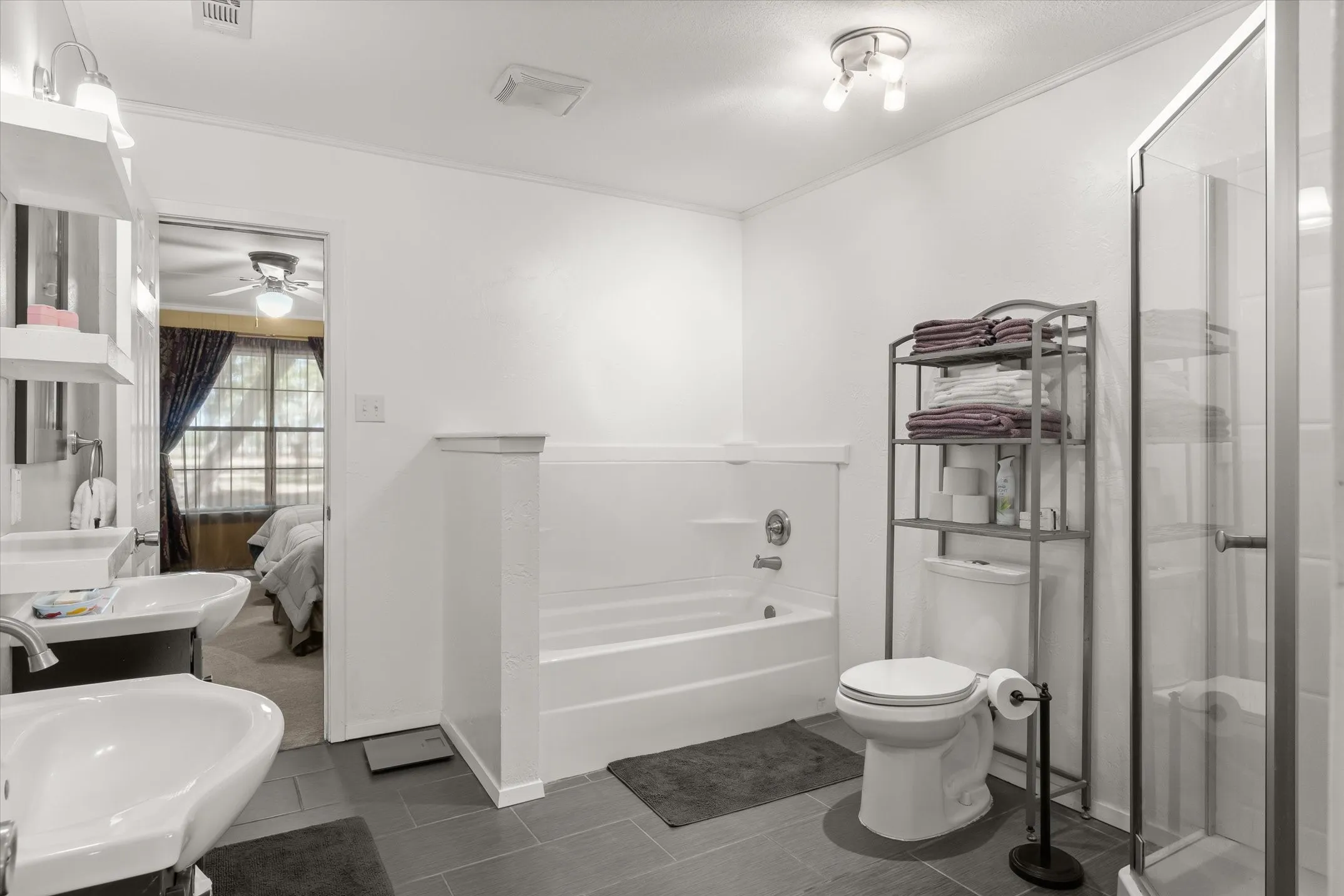 Guest jack and jill bath with tub and walk shower
