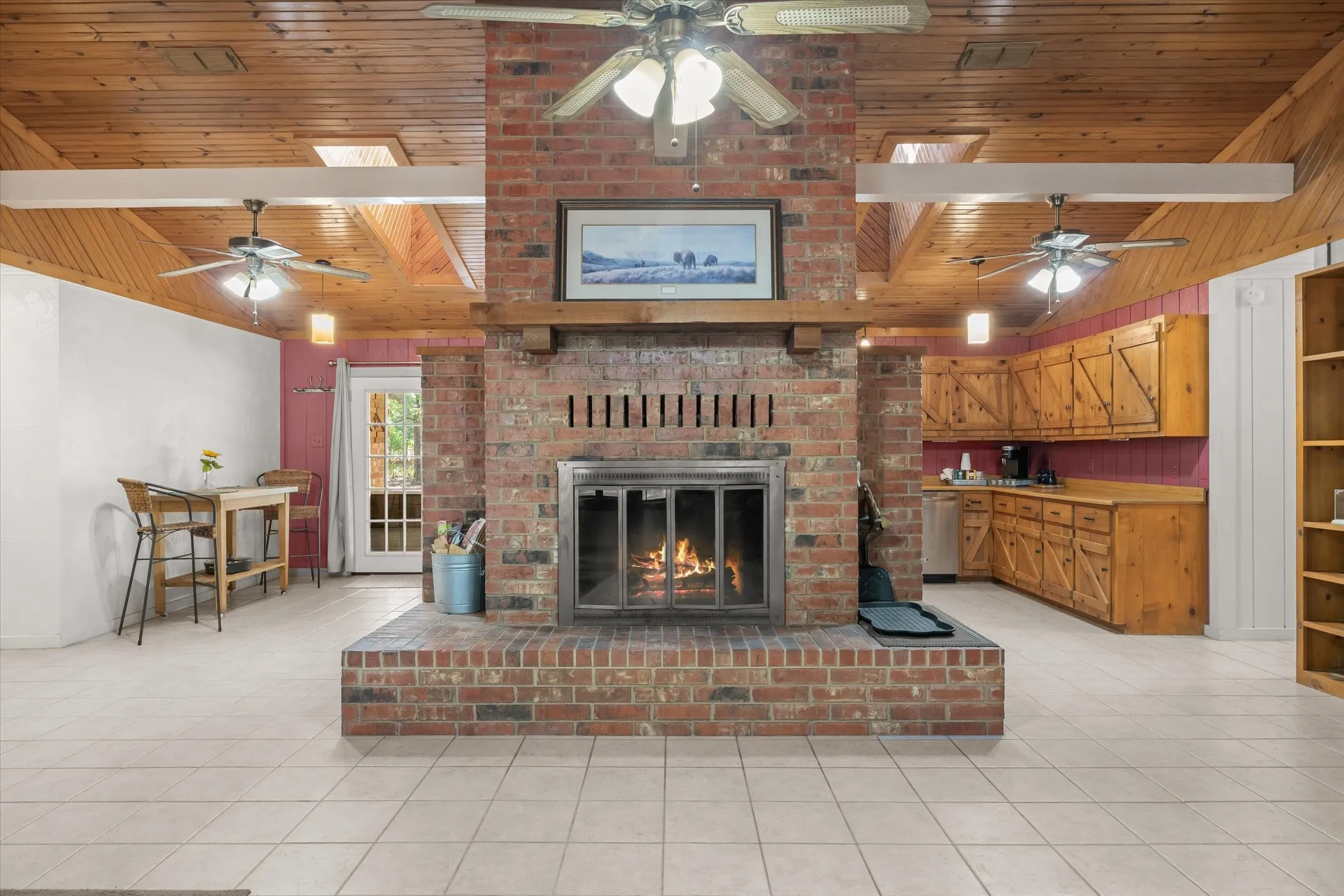 Pine beadboard ceilings and large cross beams