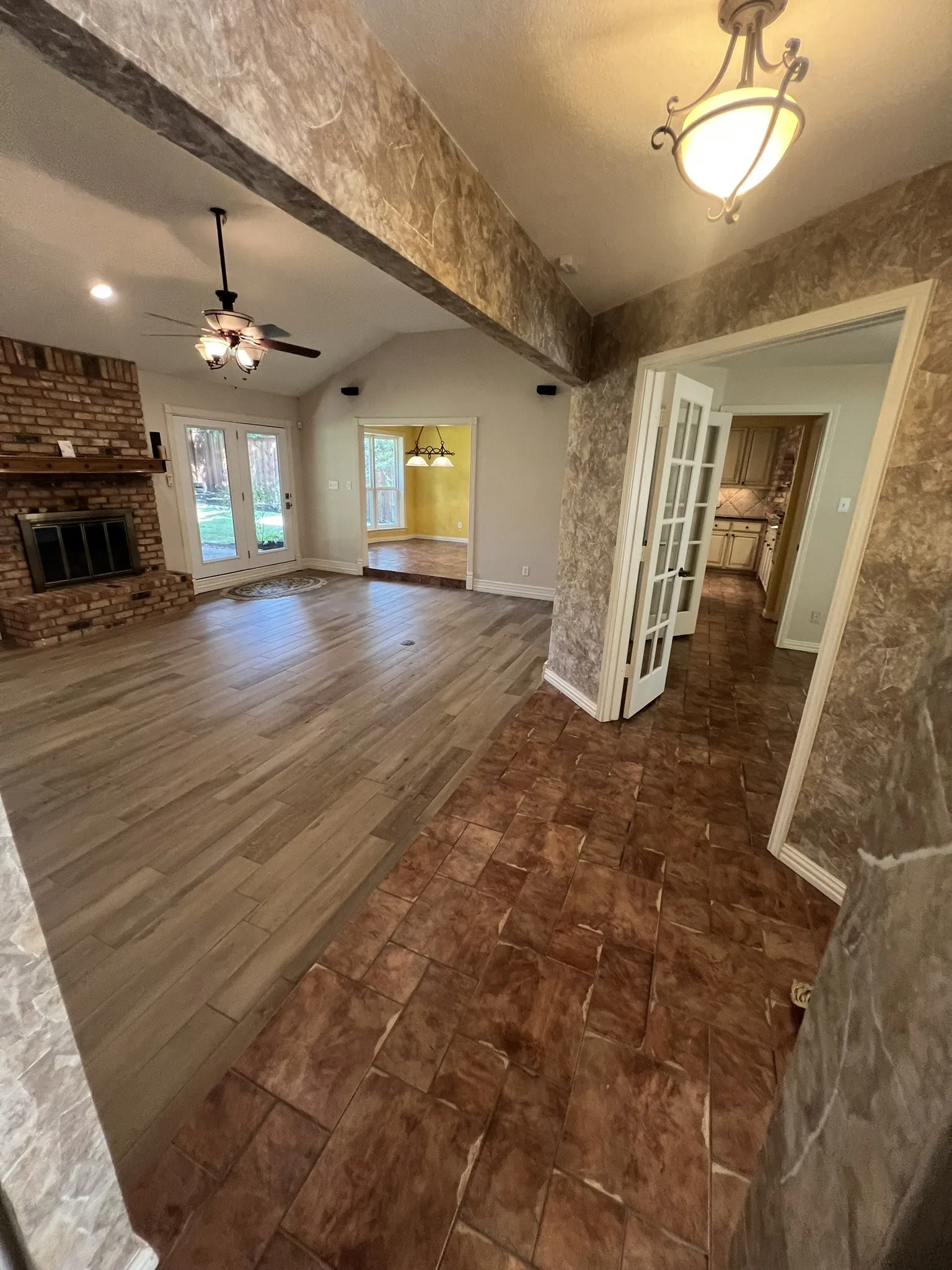 View of Entry Way - Breakfast Room or Study - Living Area- Dining Area and Kitchen