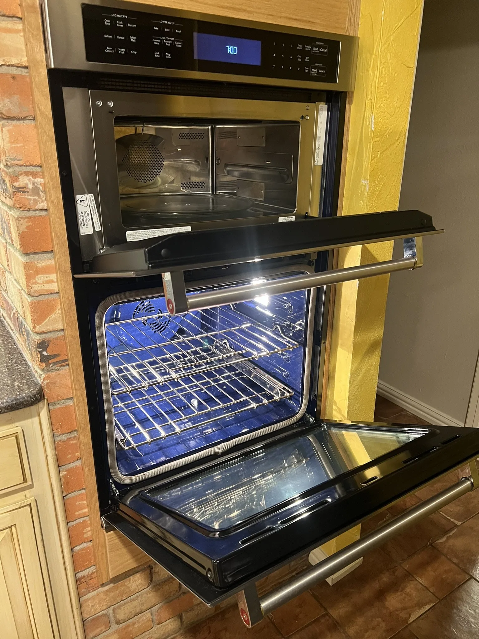 Built-in stainless steel wall oven and microwave combination with digital controls
