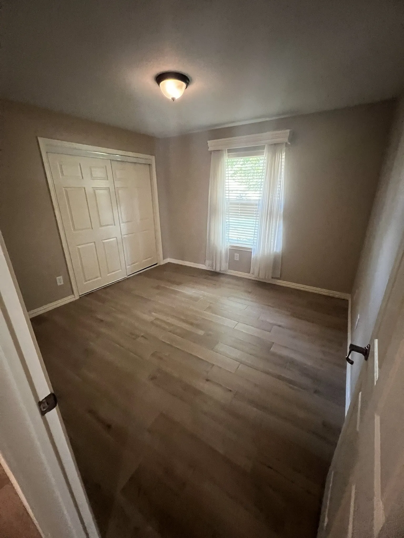 Bedroom 3 Wood-finish flooring throughout