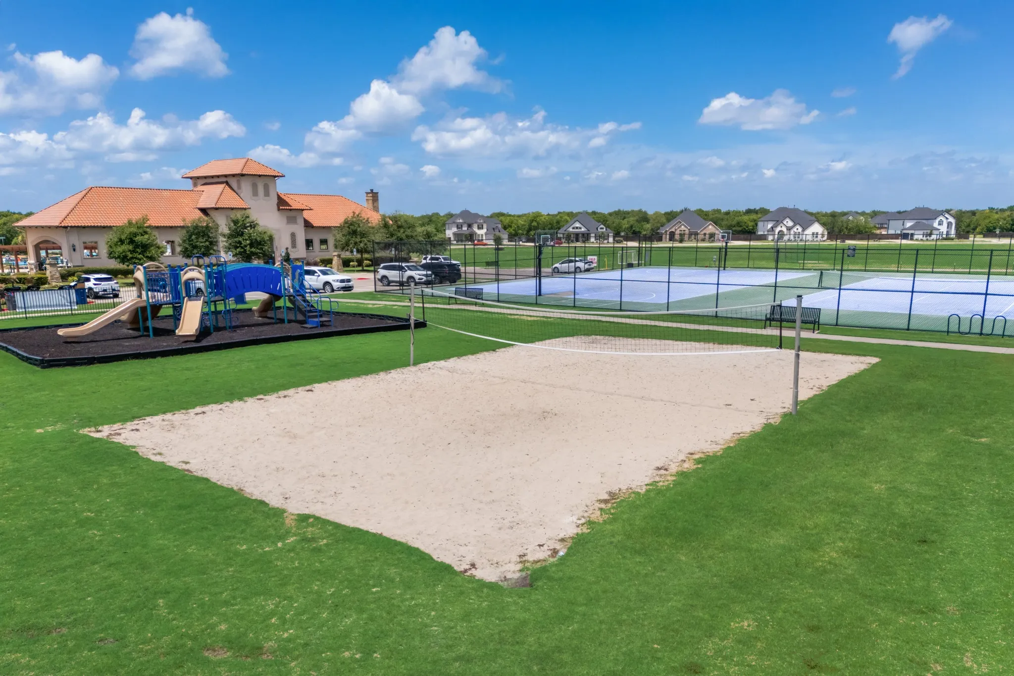 Community playground, courts, and vbeach olleyball pit