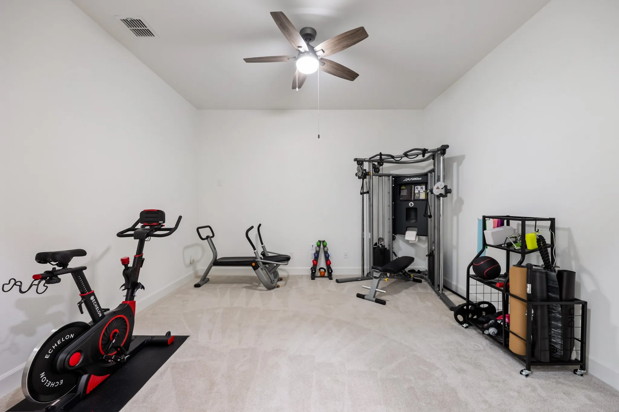 Media room, hobby room or perfect for a workout room with french doors