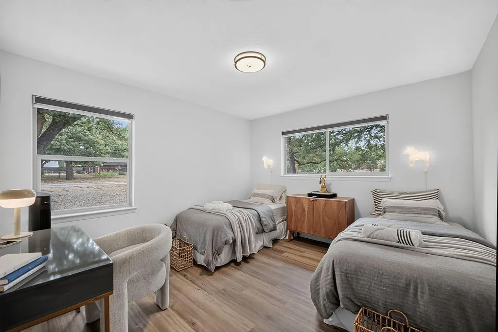 White walls with wood-finish flooring