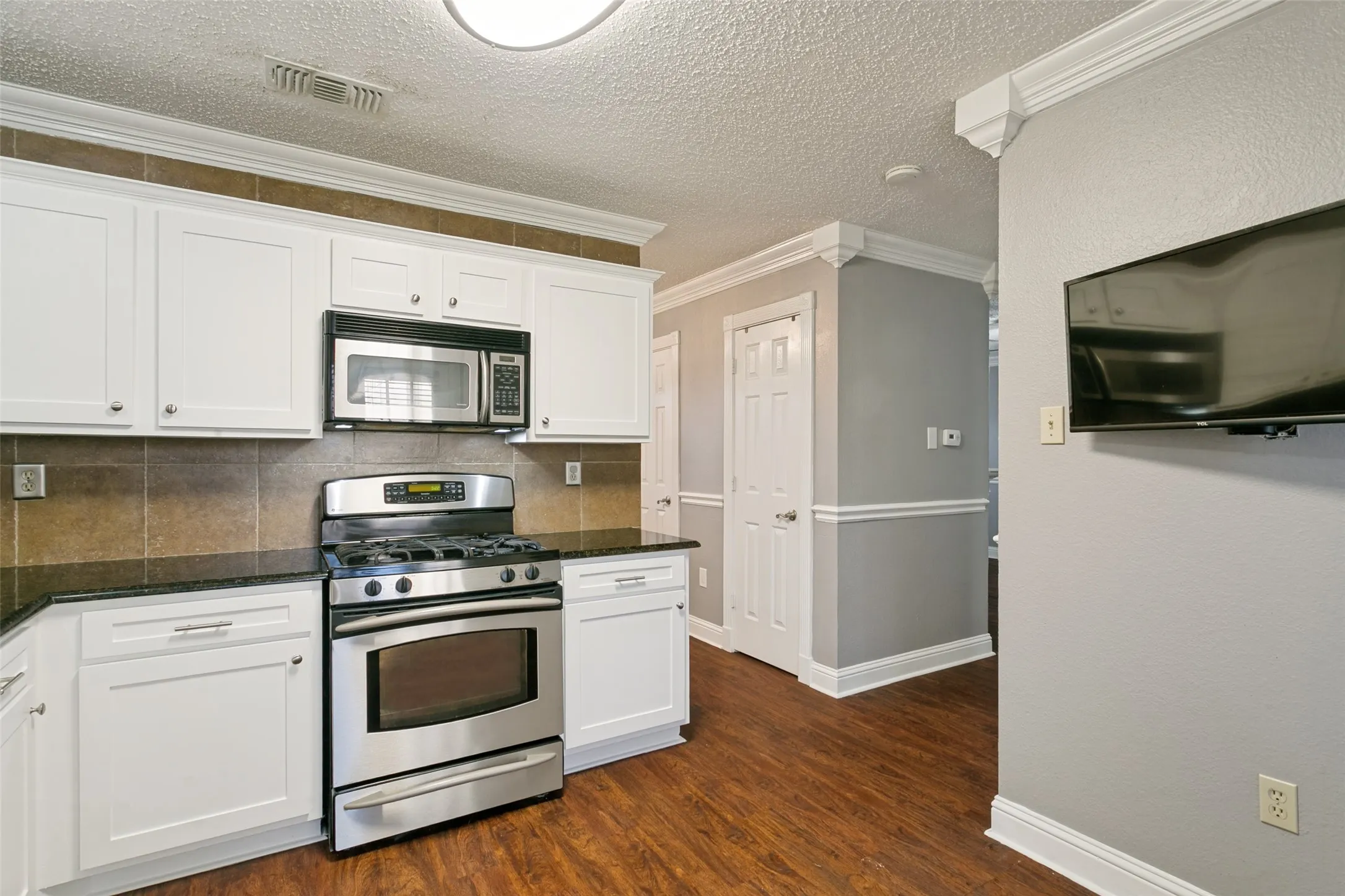 Kitchen cabinets refaced and painted in July 2026