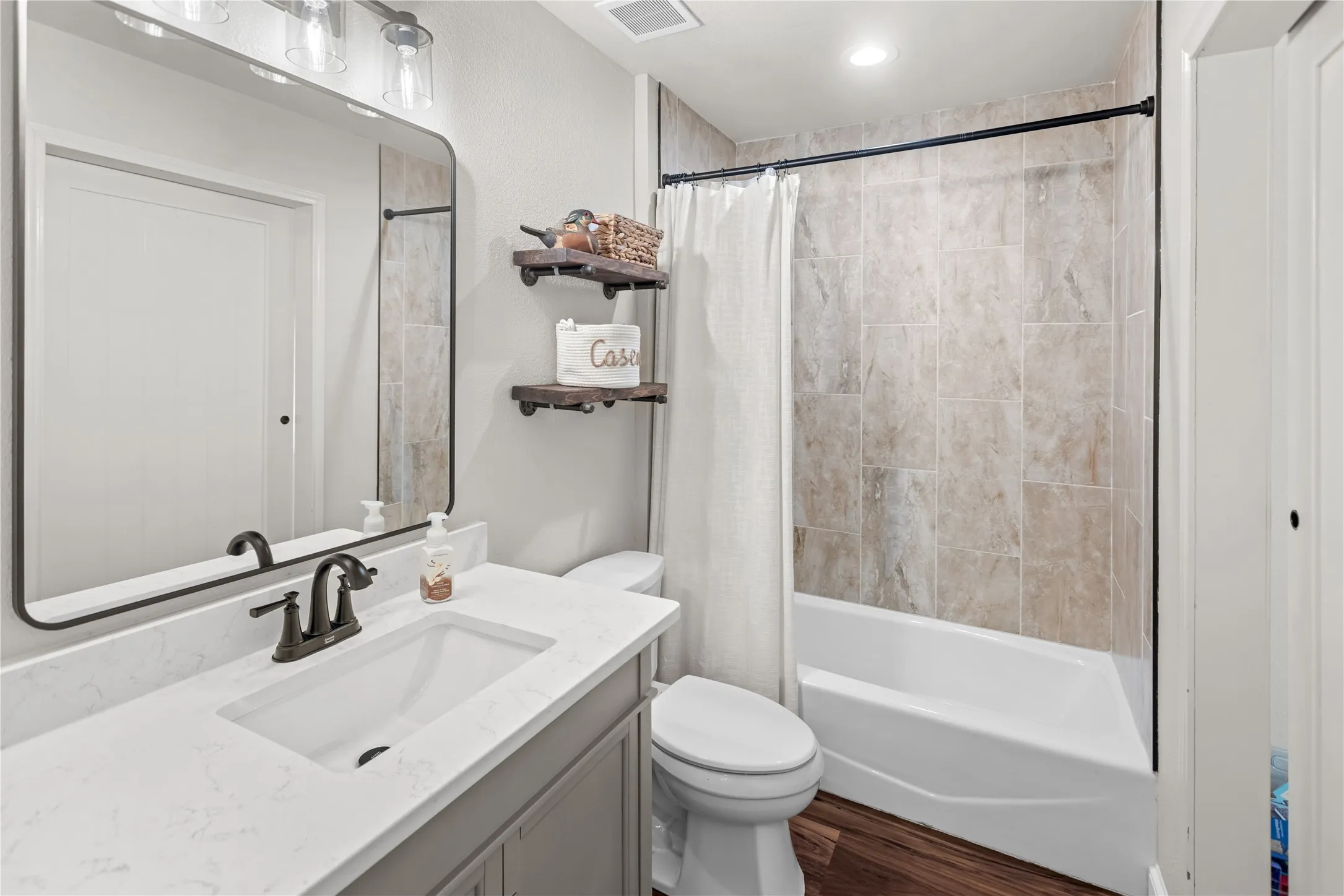 Inviting guest bathroom with updated finishes.