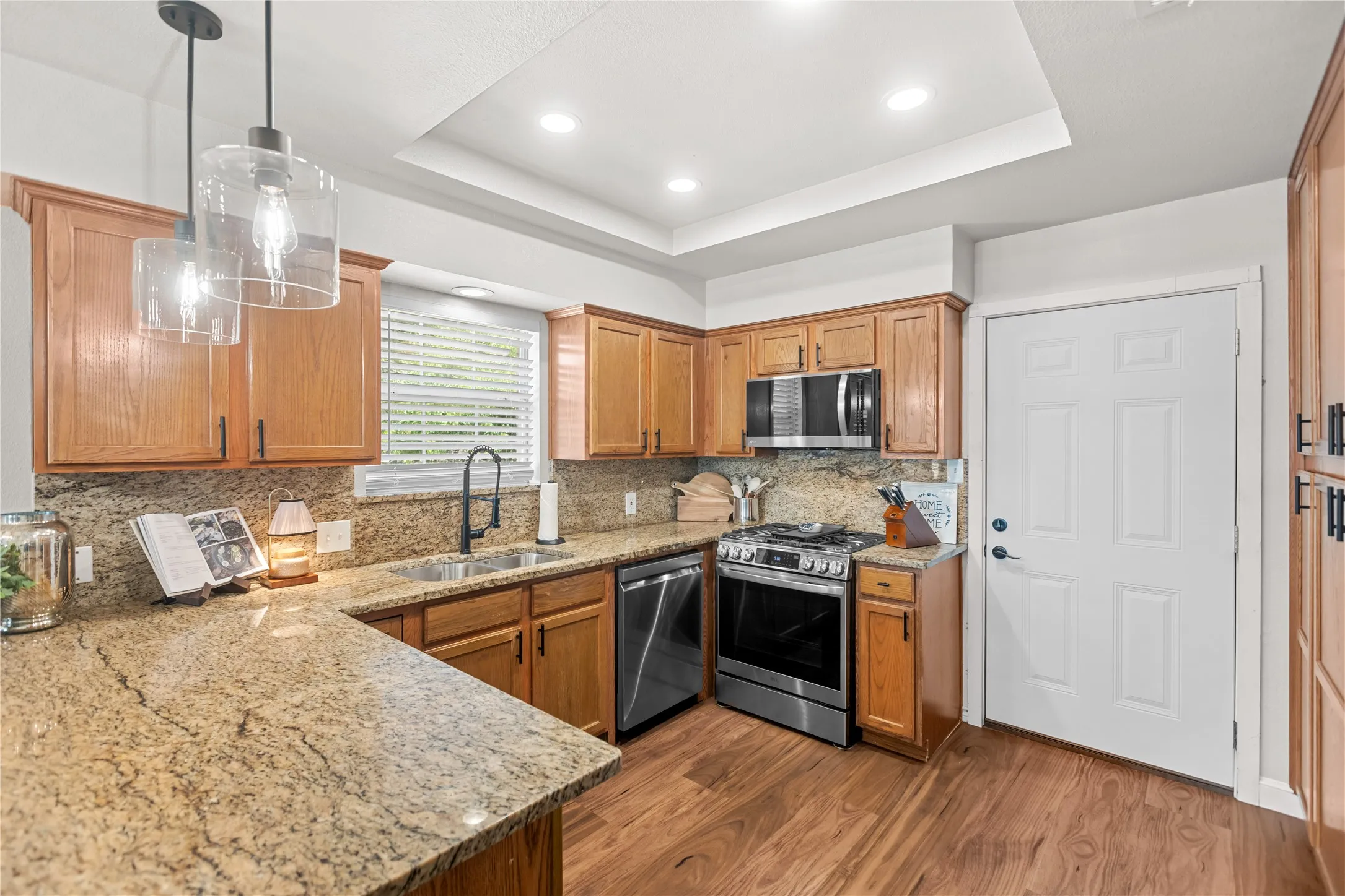Updated kitchen with modern touches and plenty of functional workspace.