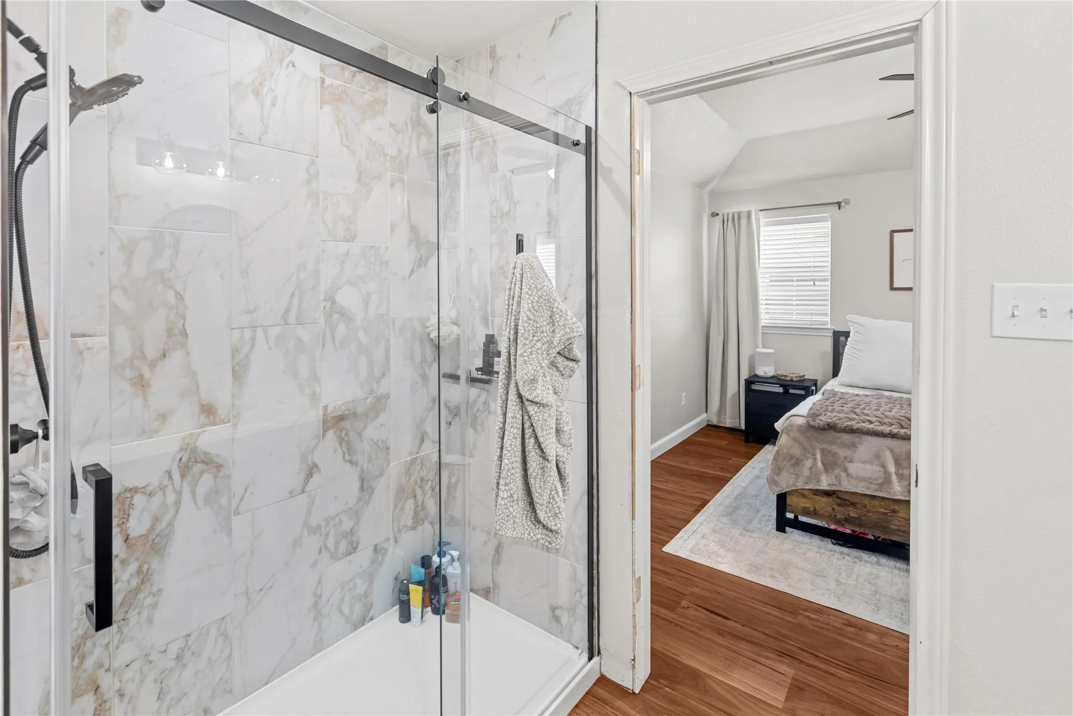 Well-appointed primary bath with updated finishes.