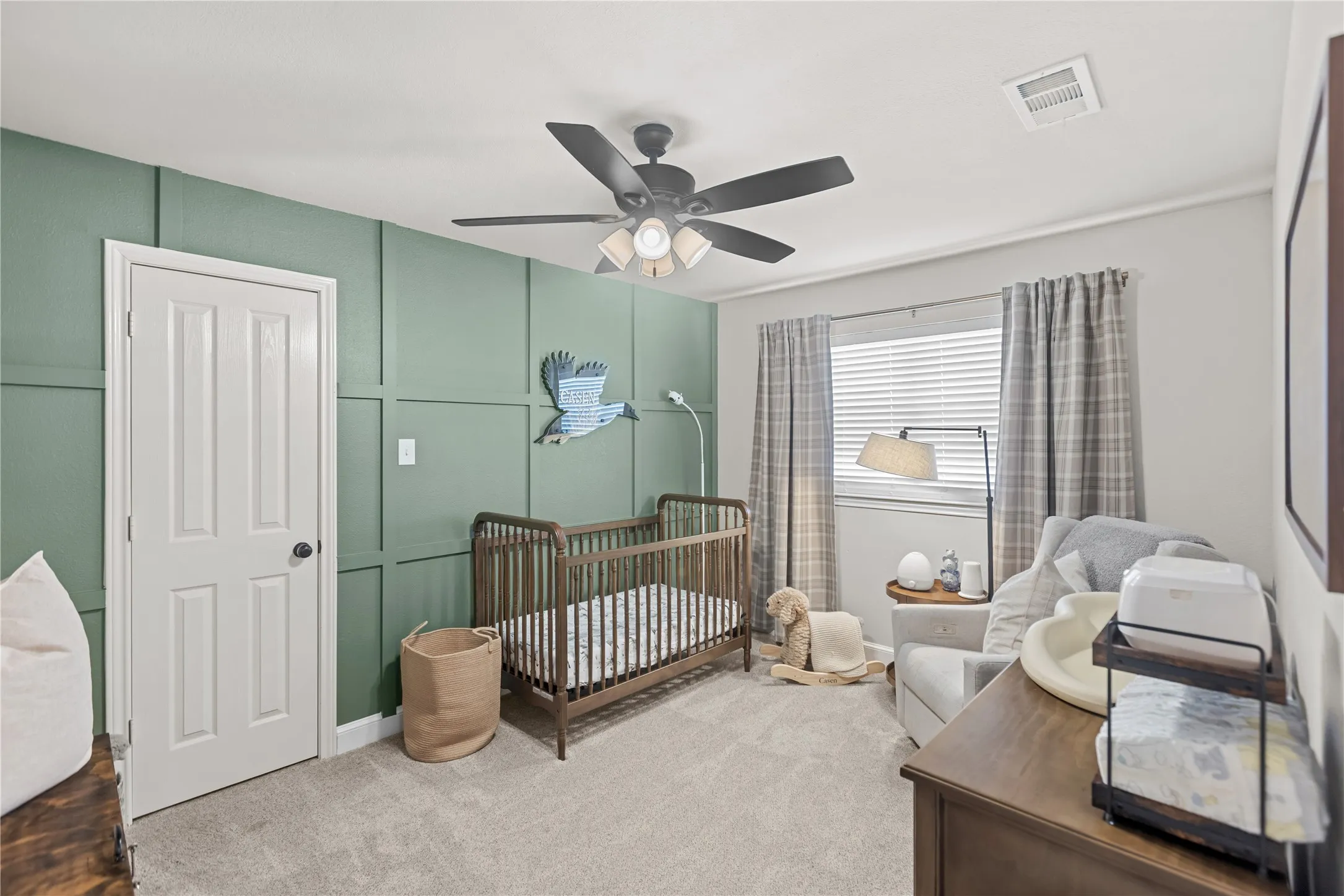 Well-sized secondary bedroom featuring a spacious walk-in closet for added storage