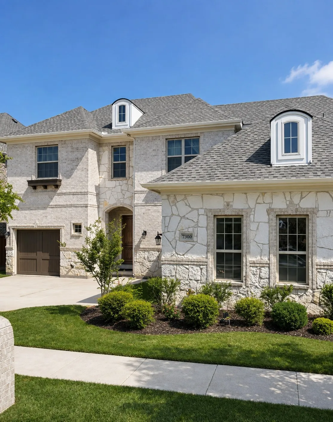 Stone and brick facade with dormer windows