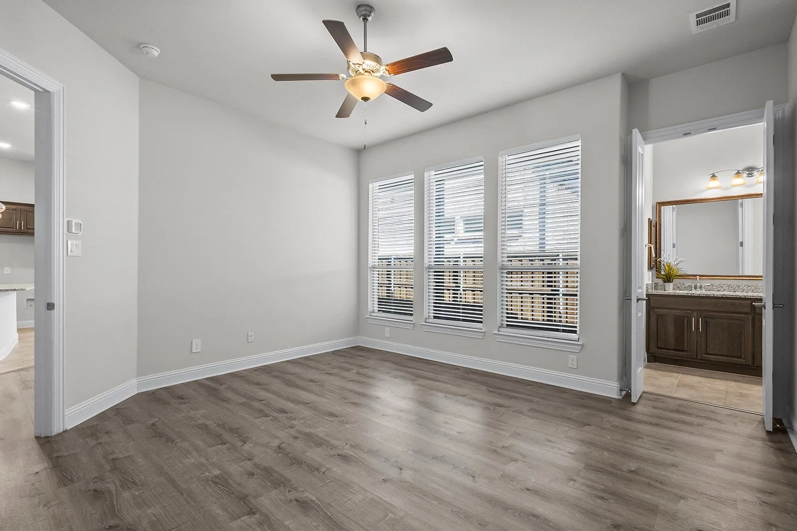 Primary suite is split from other bedrooms