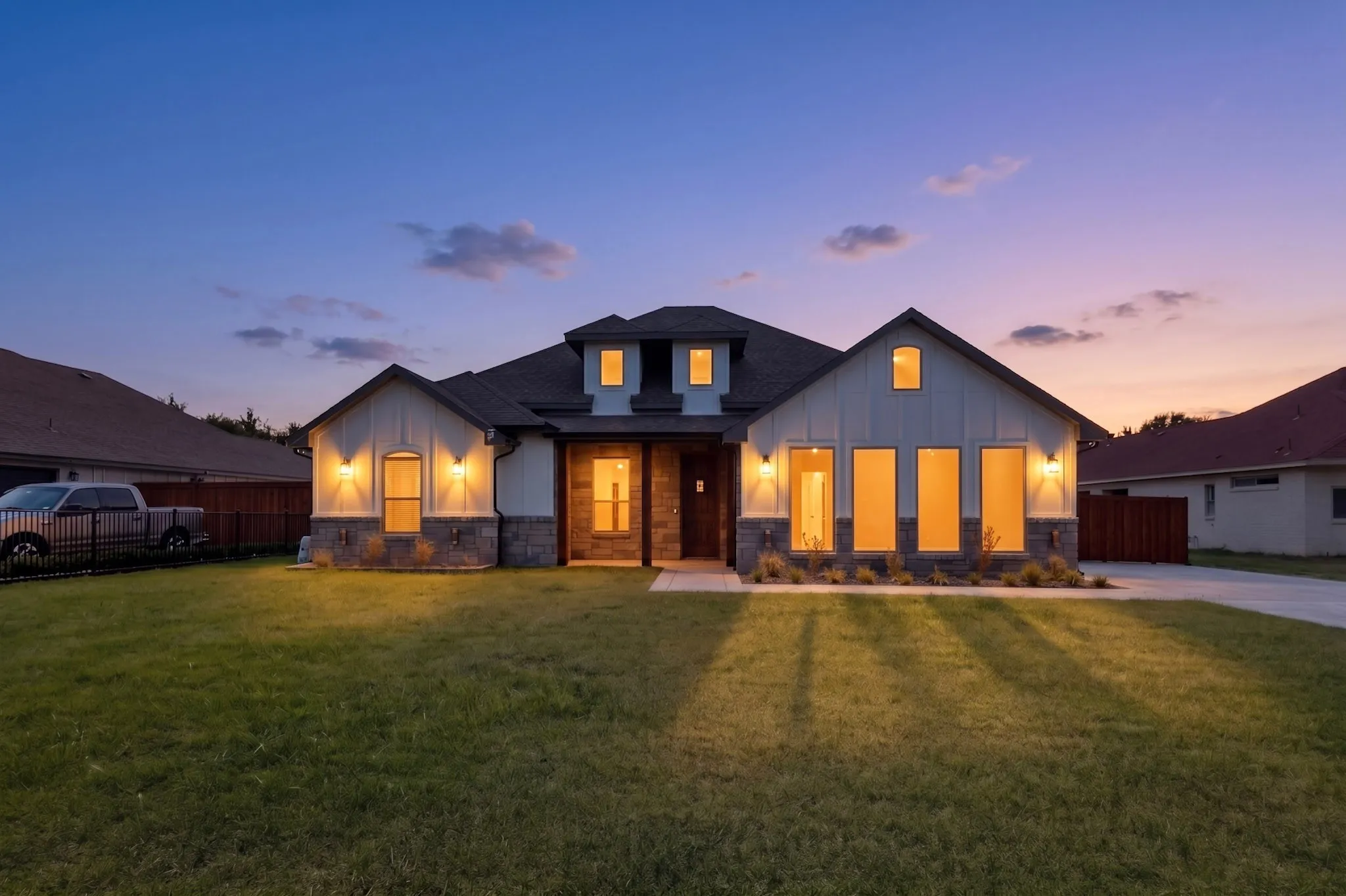  home with a stone and board-and-batten facade