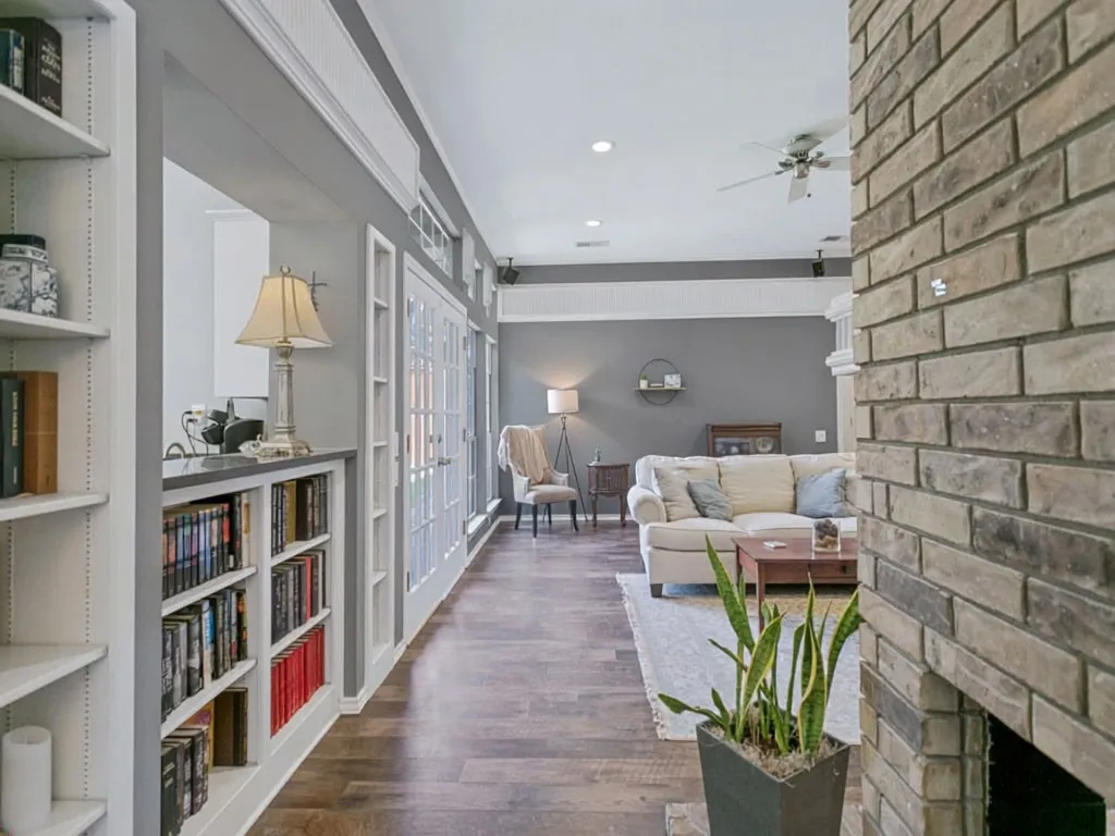 Don't miss the architectural details and all the built-in in this former model home.