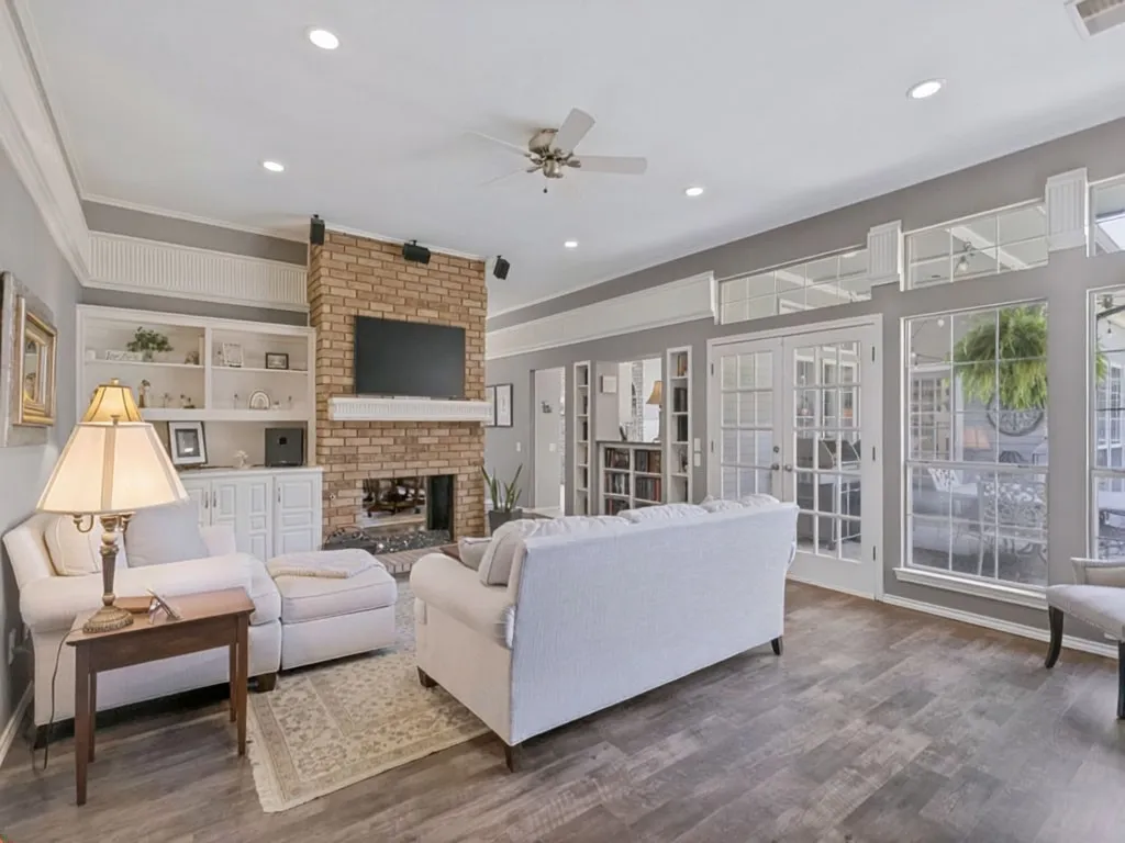 A great place to relax and entertain with quick access to the kitchen and pass through window at butler's pantry.