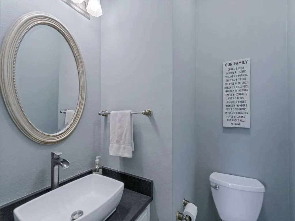 A great powder bath for guest is centrally located.