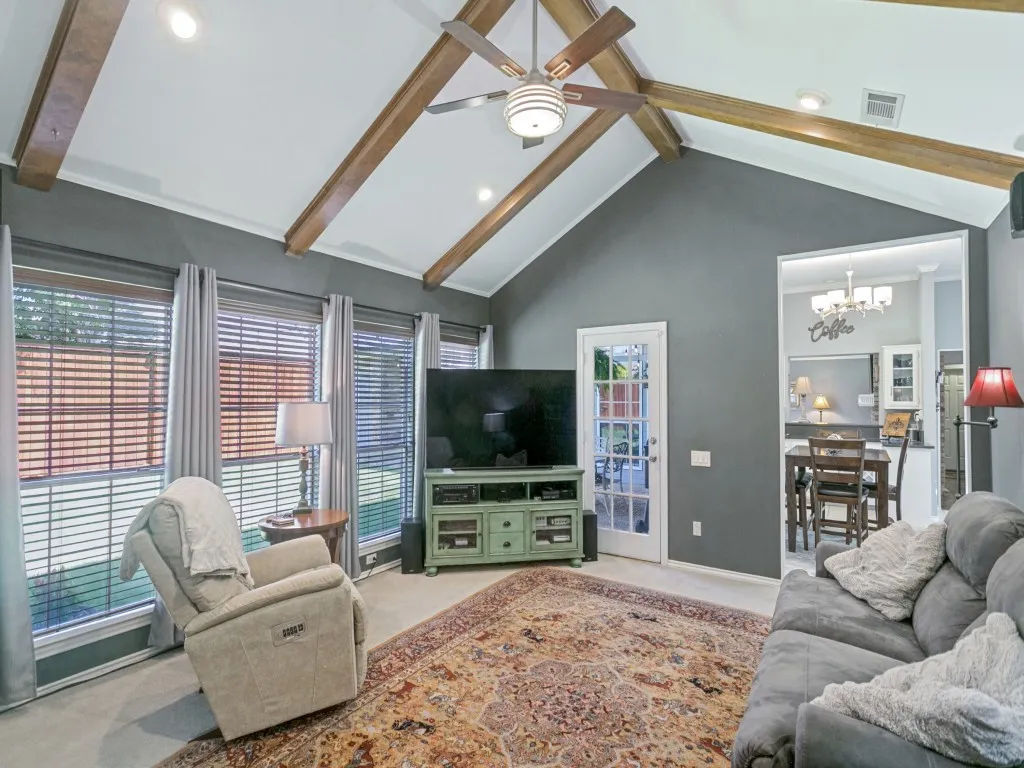 The second living area has backyard access and great space.