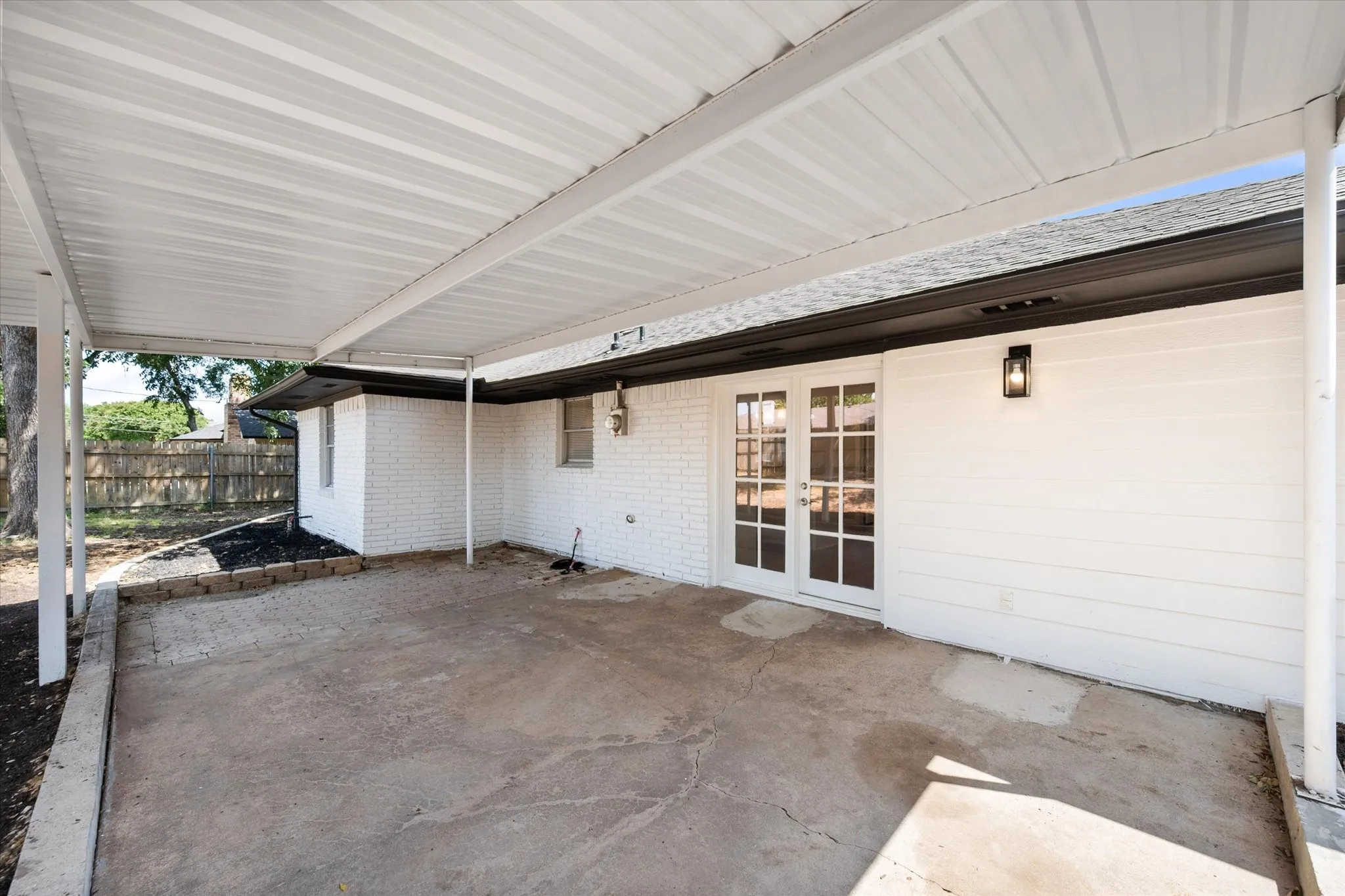 Covered patio makes this space so useful even when the sun is out