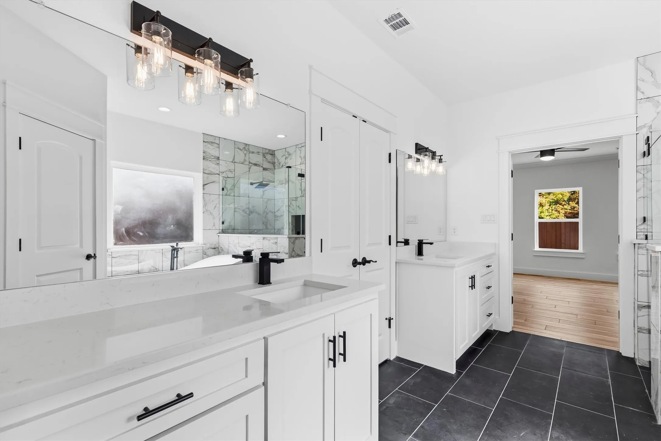Dual vanities in primary suite