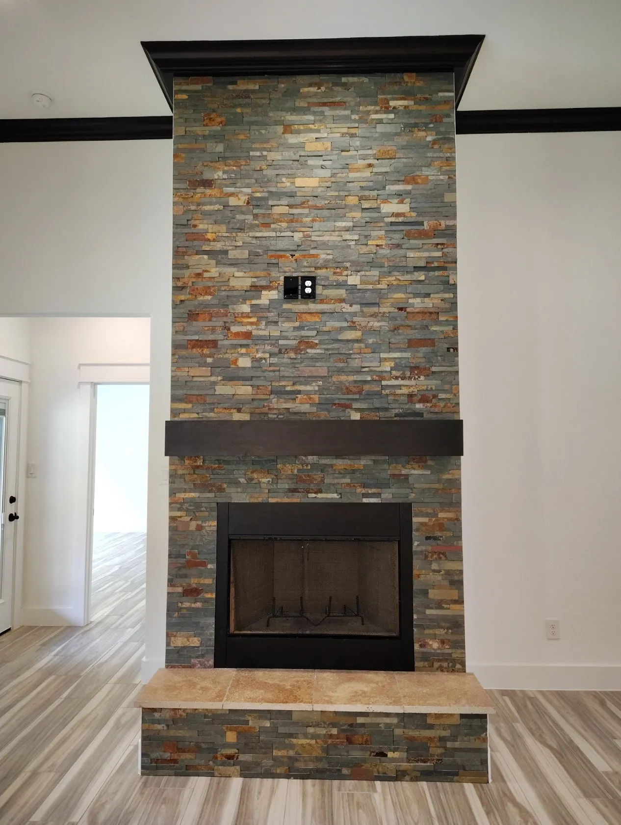 Ledgerstone fireplace with12' ceilings