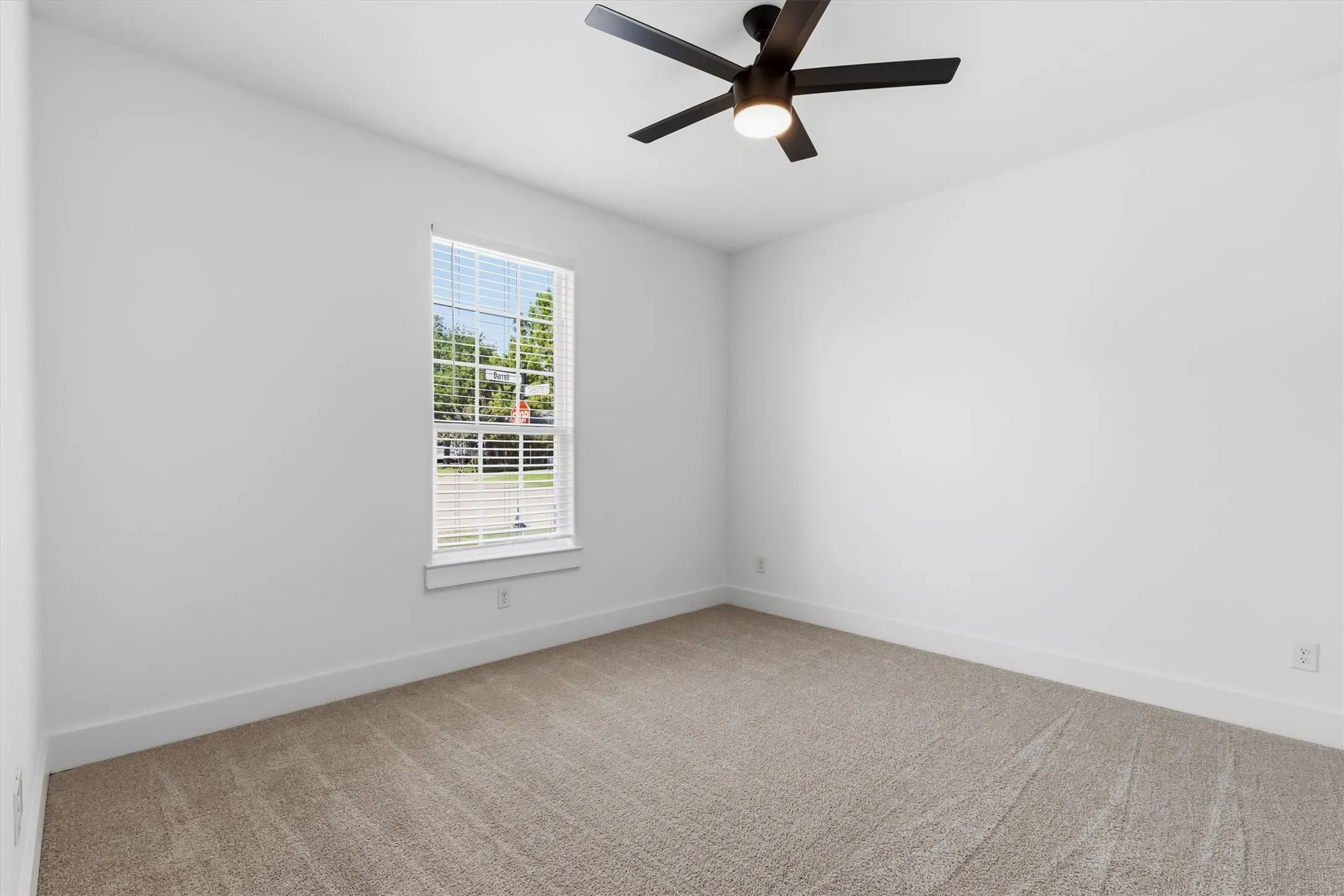 Guest bedroom 2 with carpeting