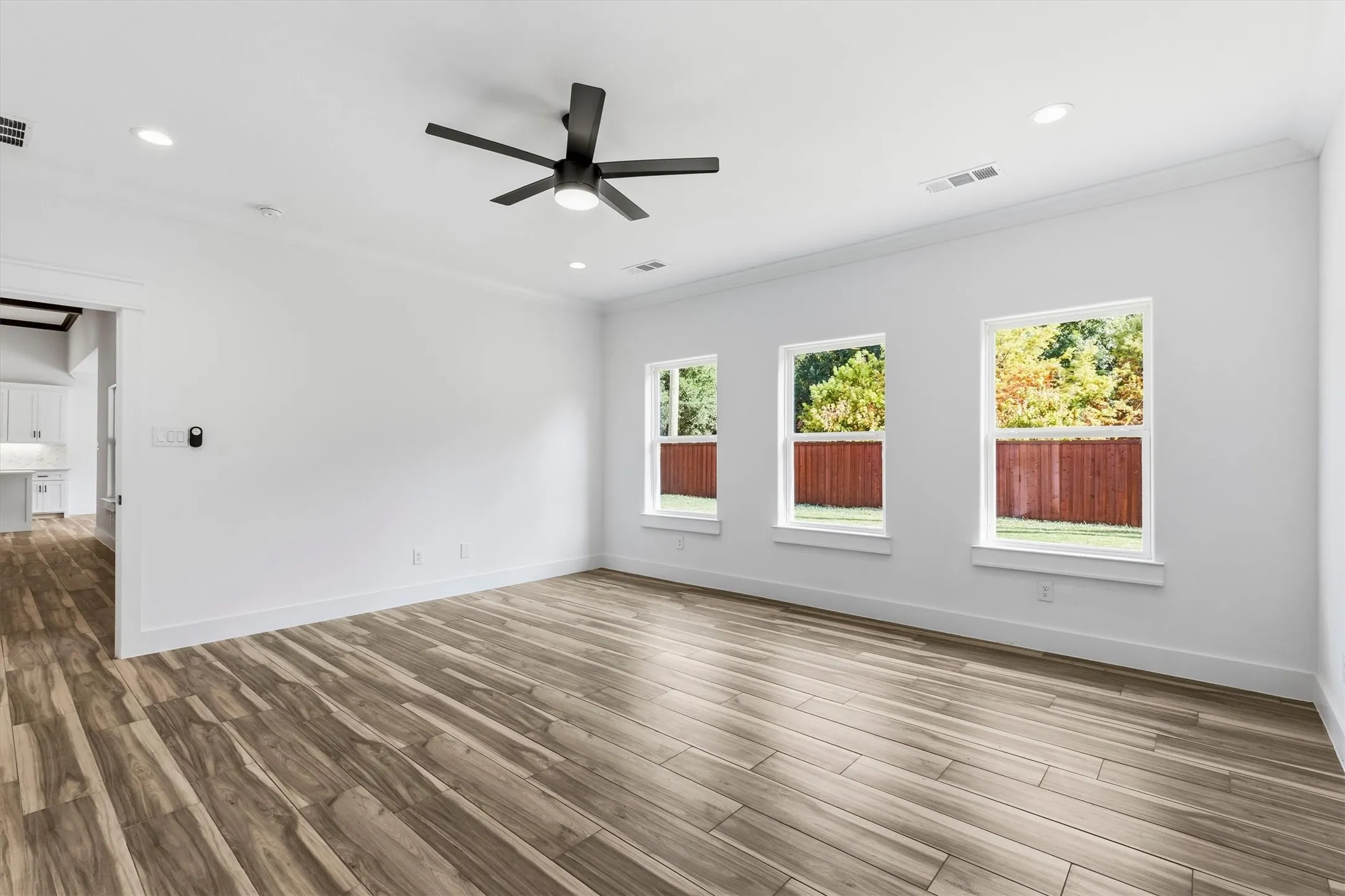 Primary bedroom and door to living area