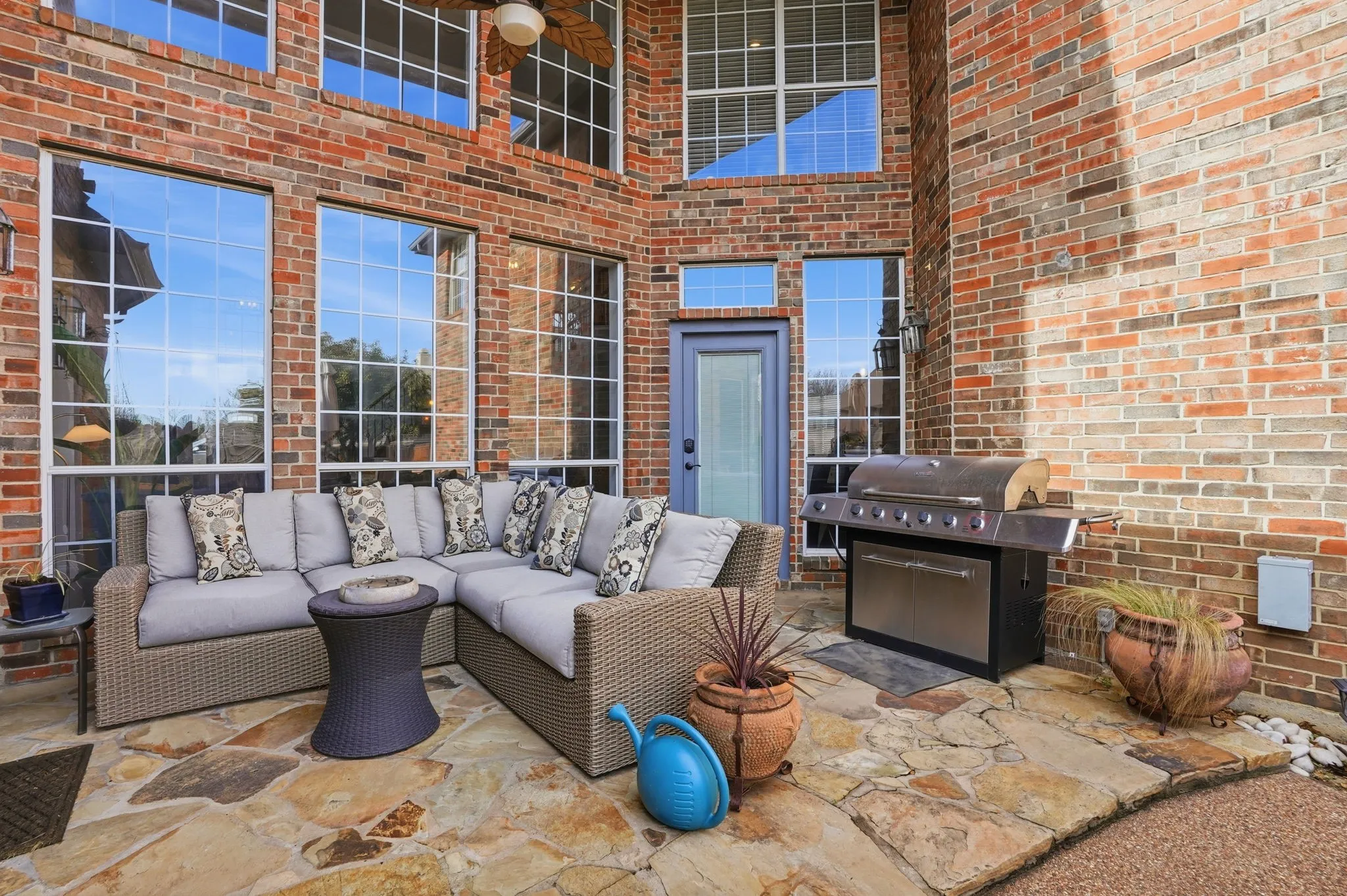 Flagstone back patio with views of the pool