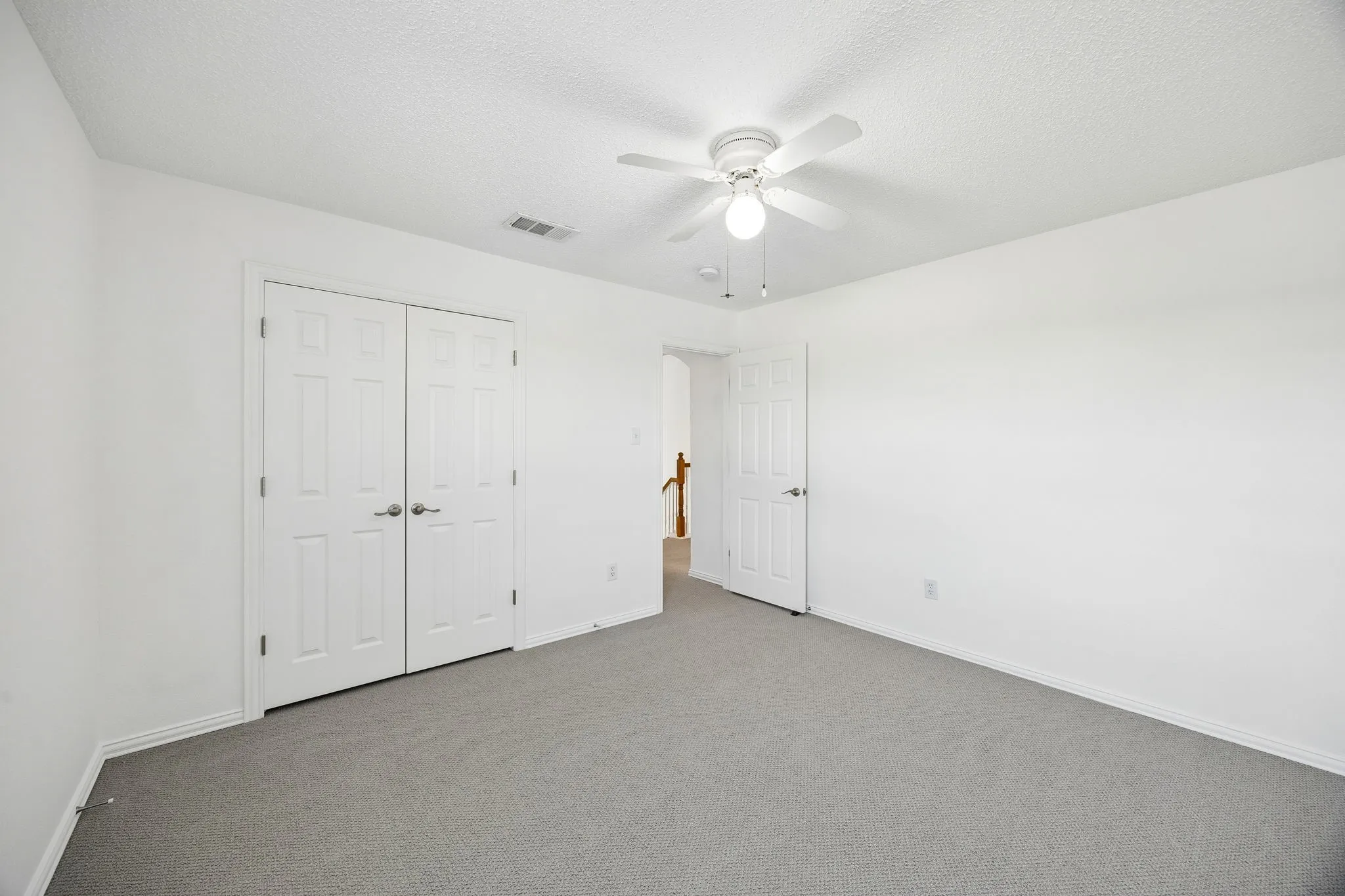 Secondary bedroom with large closet