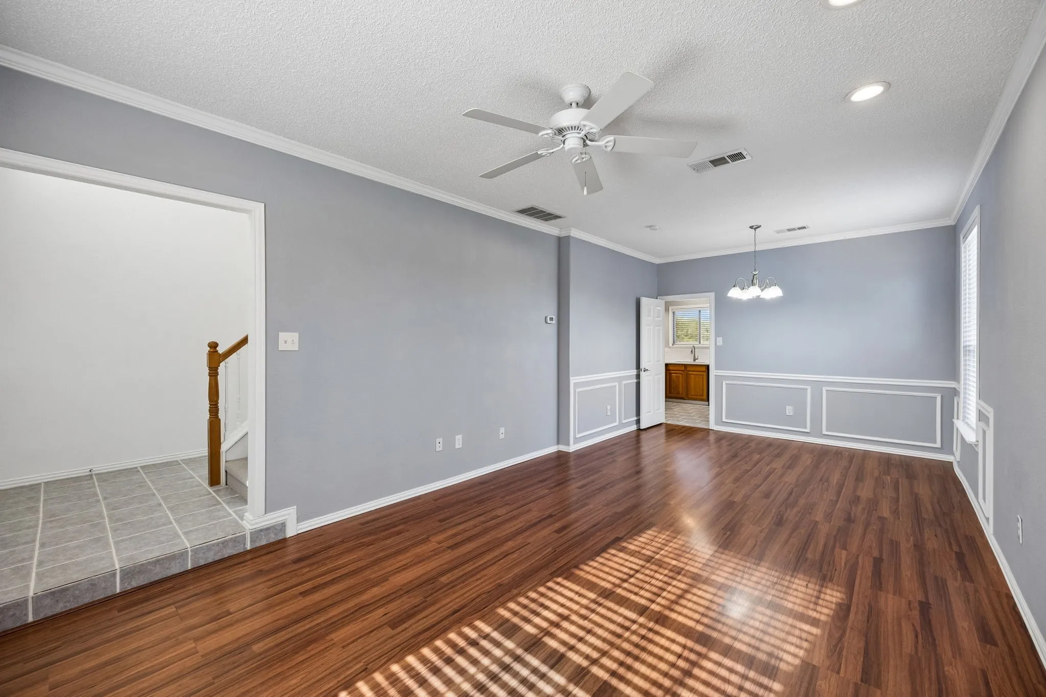 Living room and dining room off entry and kitchen.
