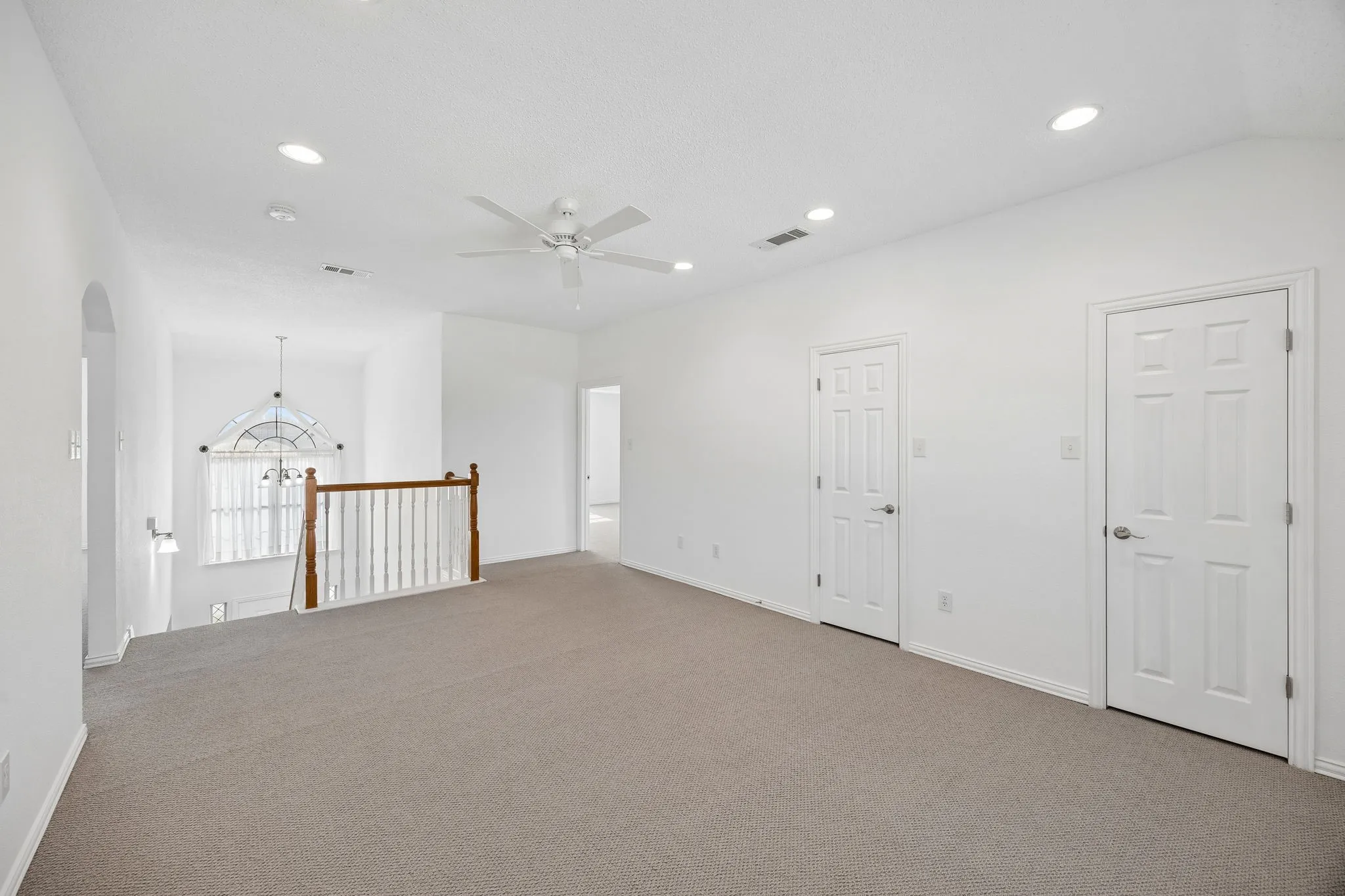Bonus room, loft, game room with view to main level entry