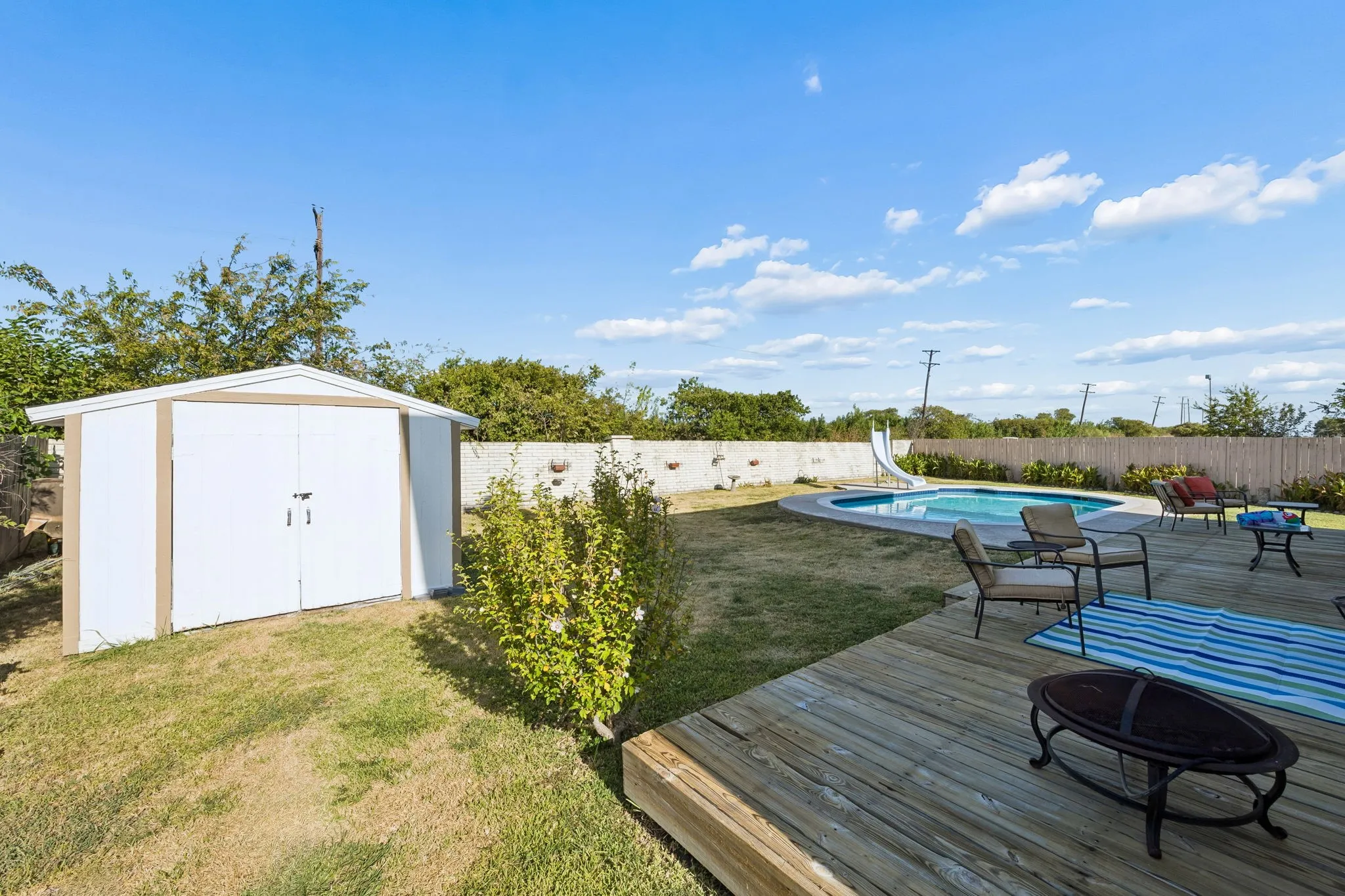 Storage shed for extra storage of pool toys, lawn equipment, whatever you need!