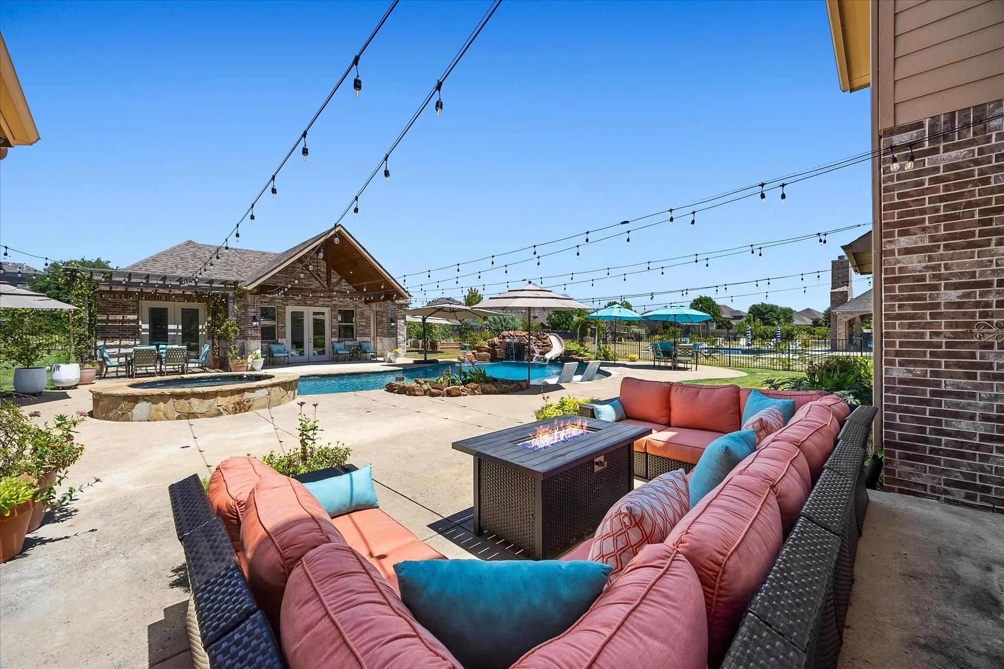 The pool area contains multiple seating areas, ideal for outdoor entertaining, relaxation and dining.