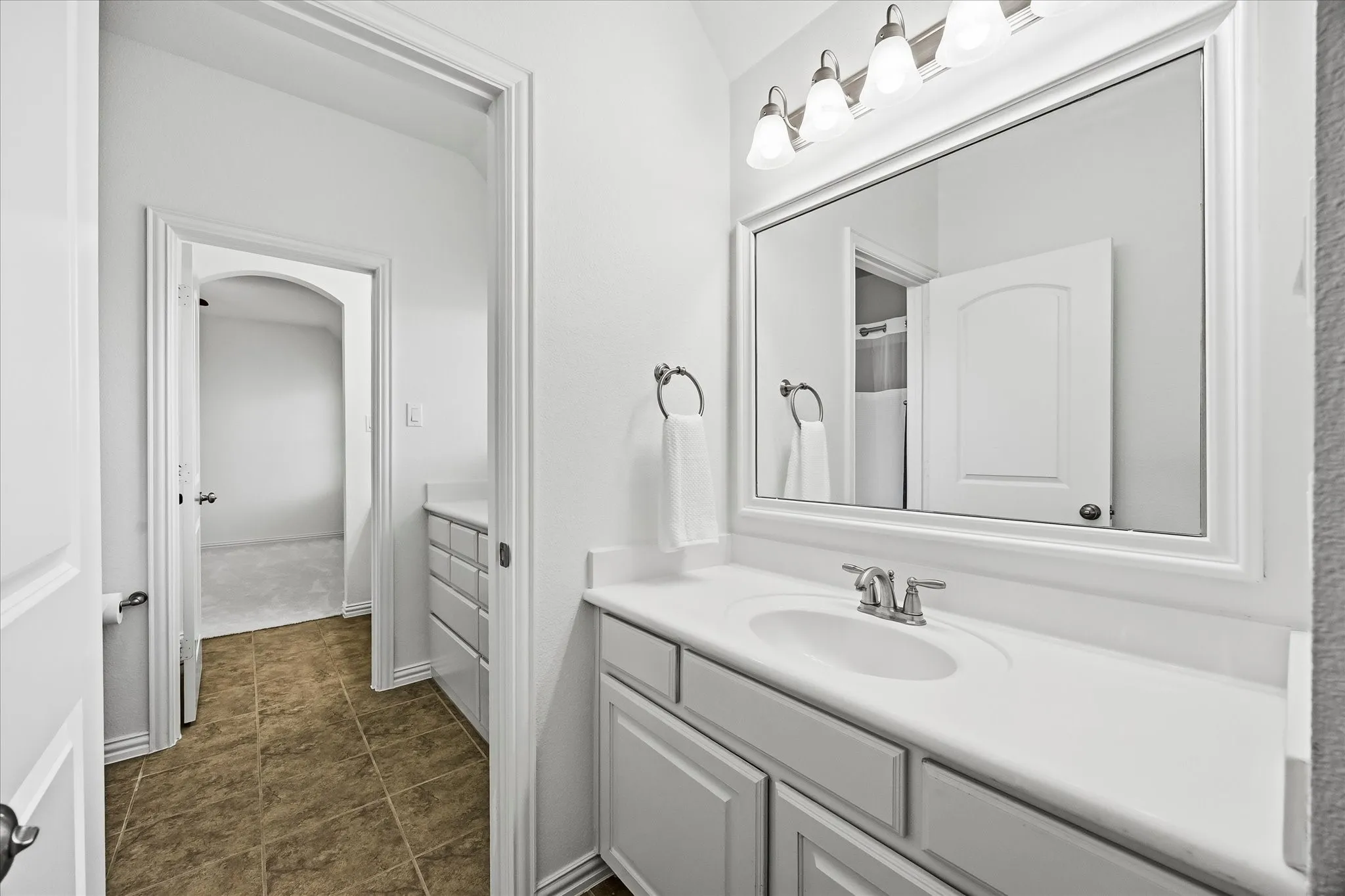 Bedrooms 3 and 4 share a Jack & Jill bathroom. Each bedroom has their own vanity area, the shared wet area has an ample amount of storage.
