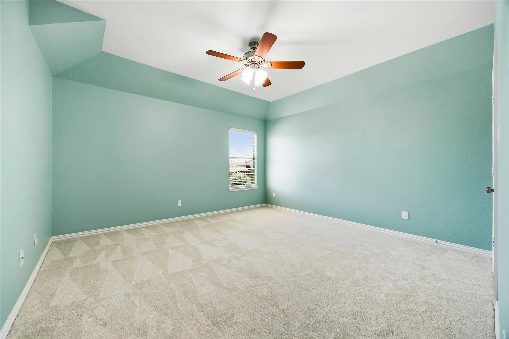 Bedroom 5 is split for privacy, the walls are the prettiest sea glass color. It has a large walk-in closet and is located next to the hall bath.