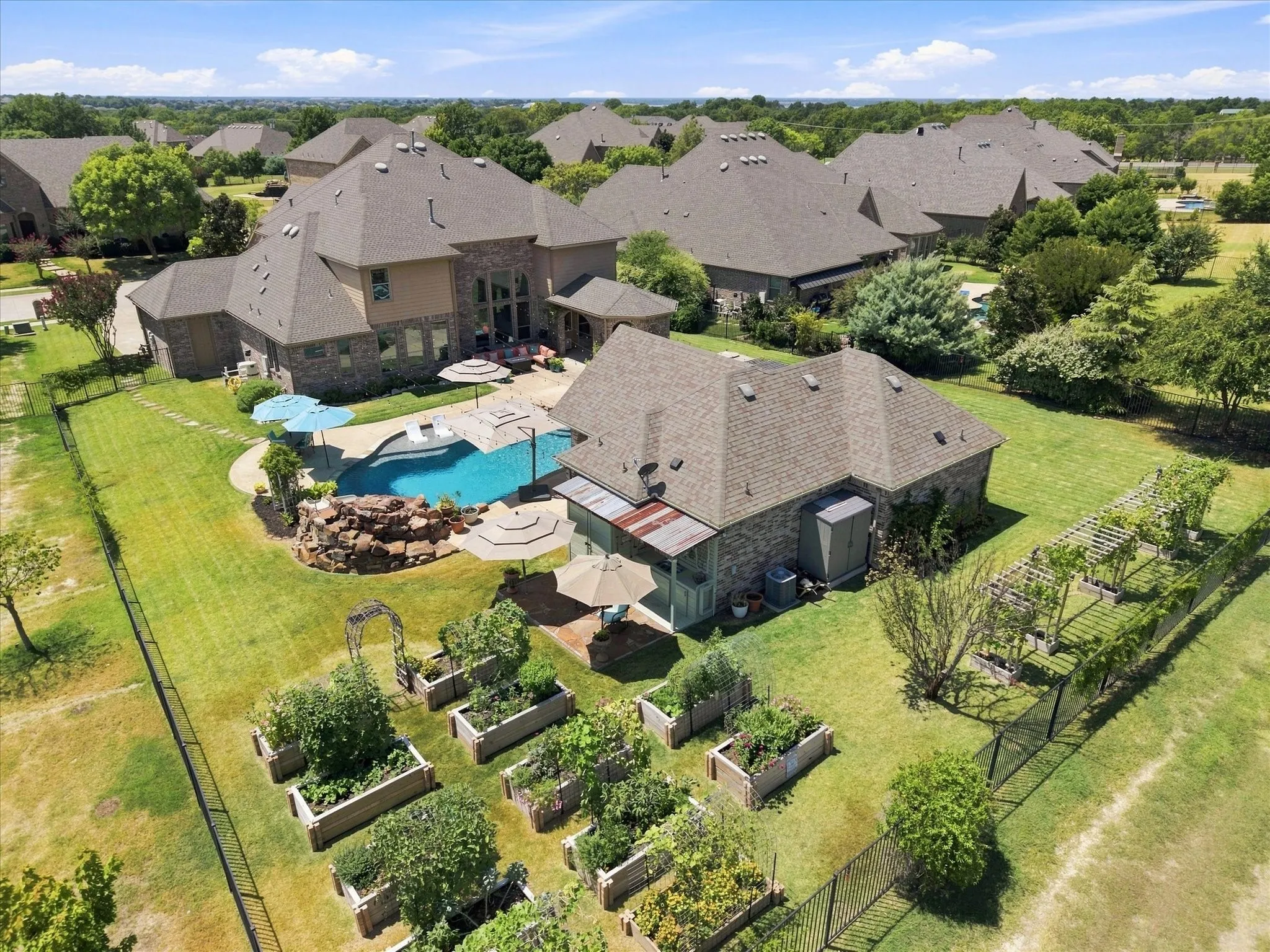 Situated on a premium greenbelt lot, this luxurious executive home truly has it all - a resort style backyard, detached accessory dwelling unit and self-sufficient garden! Two 2-car garages provide ample space for protected parking, projects and storage.