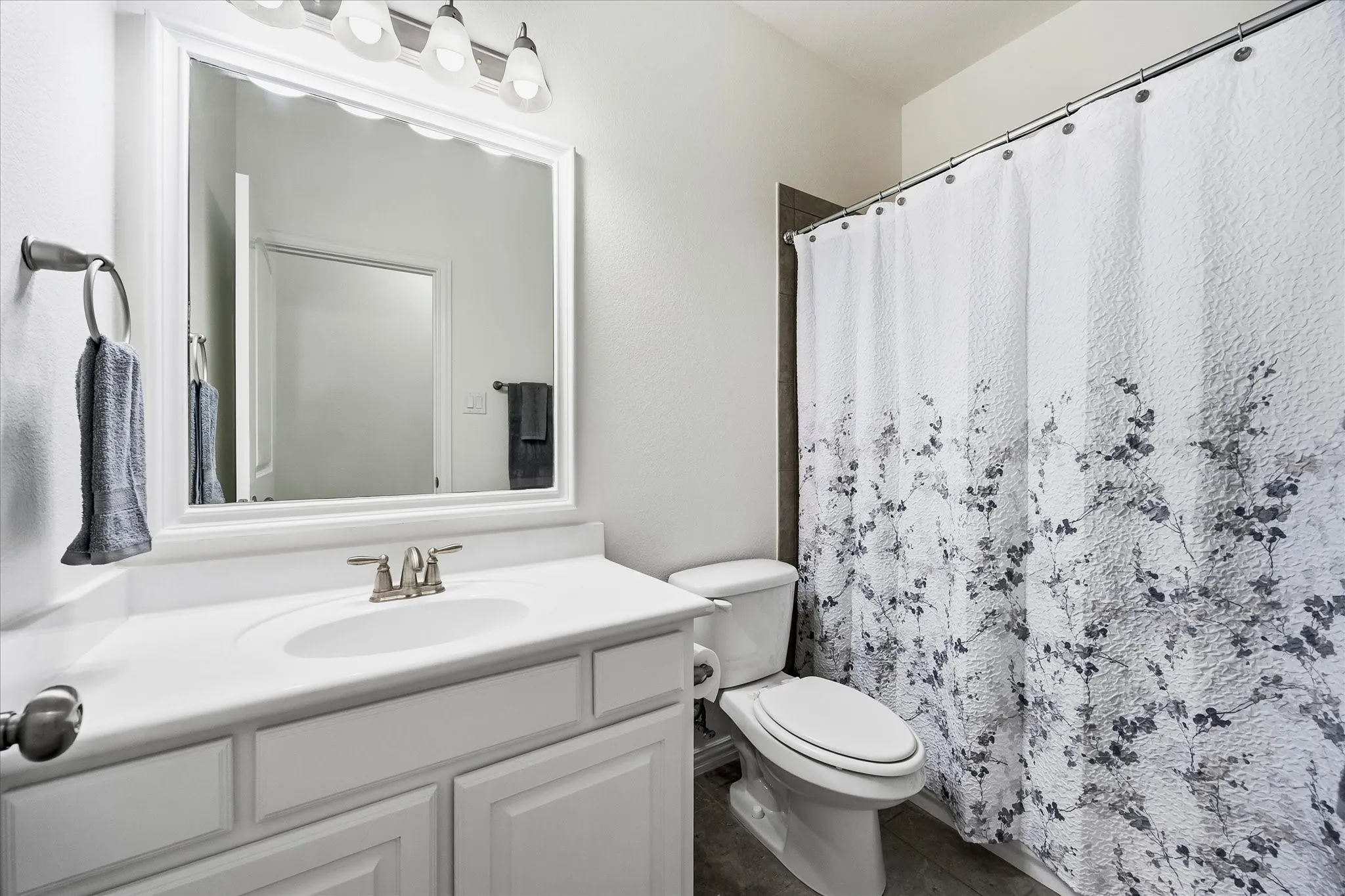 The game and media rooms have access to this full bath, along with bedroom 5.