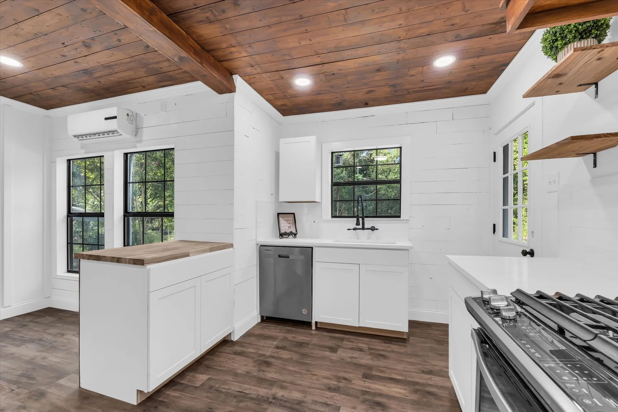 Wood-finish flooring with a contrasting wood-plank ceiling