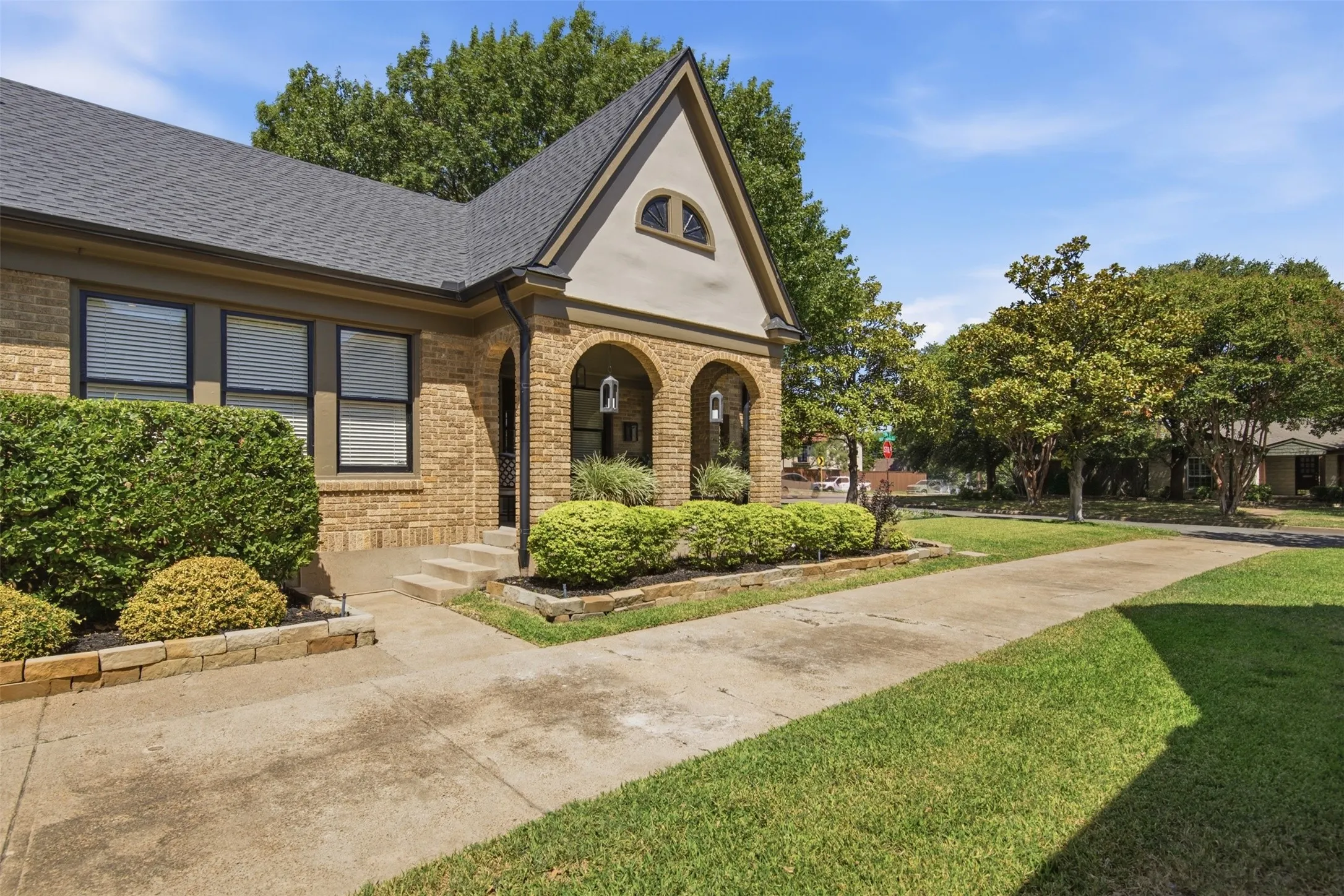 Fabulous front porch with arched openings - perfect for late afternoon cocktails and breezes.