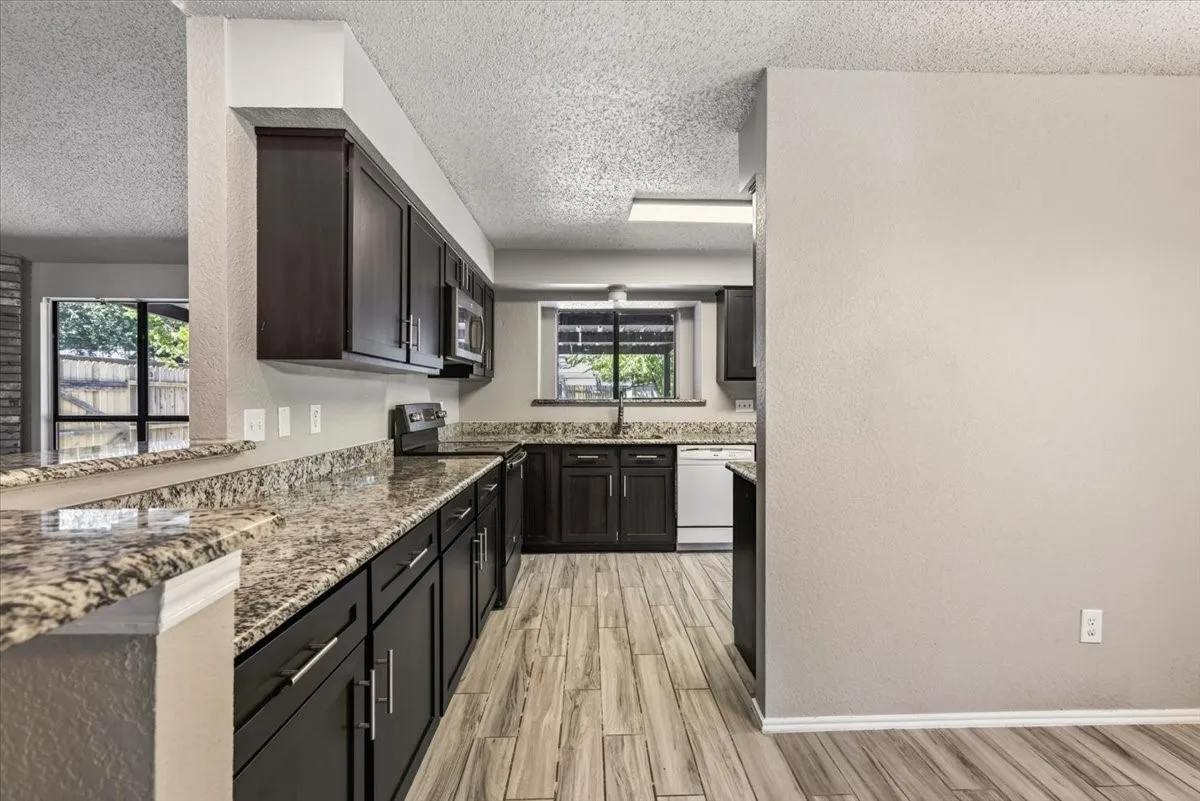 Lots of counter space with beautiful updated cabinets