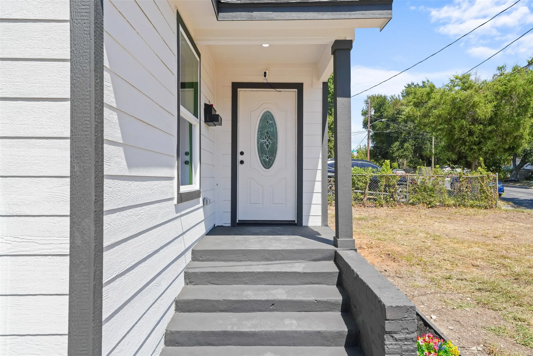White horizontal siding with contrasting trim