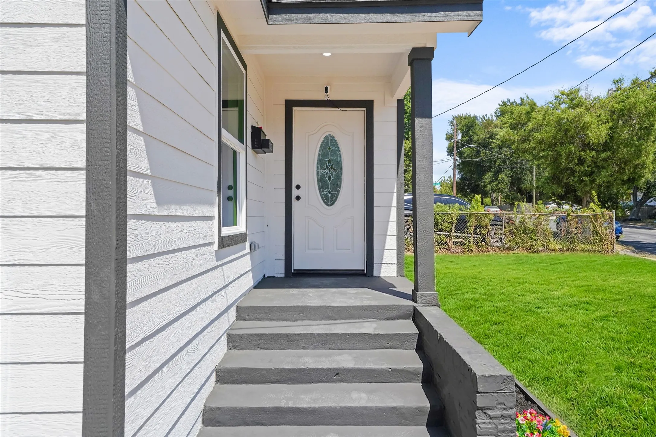 White horizontal siding exterior with dark trim accents and ai generated loan