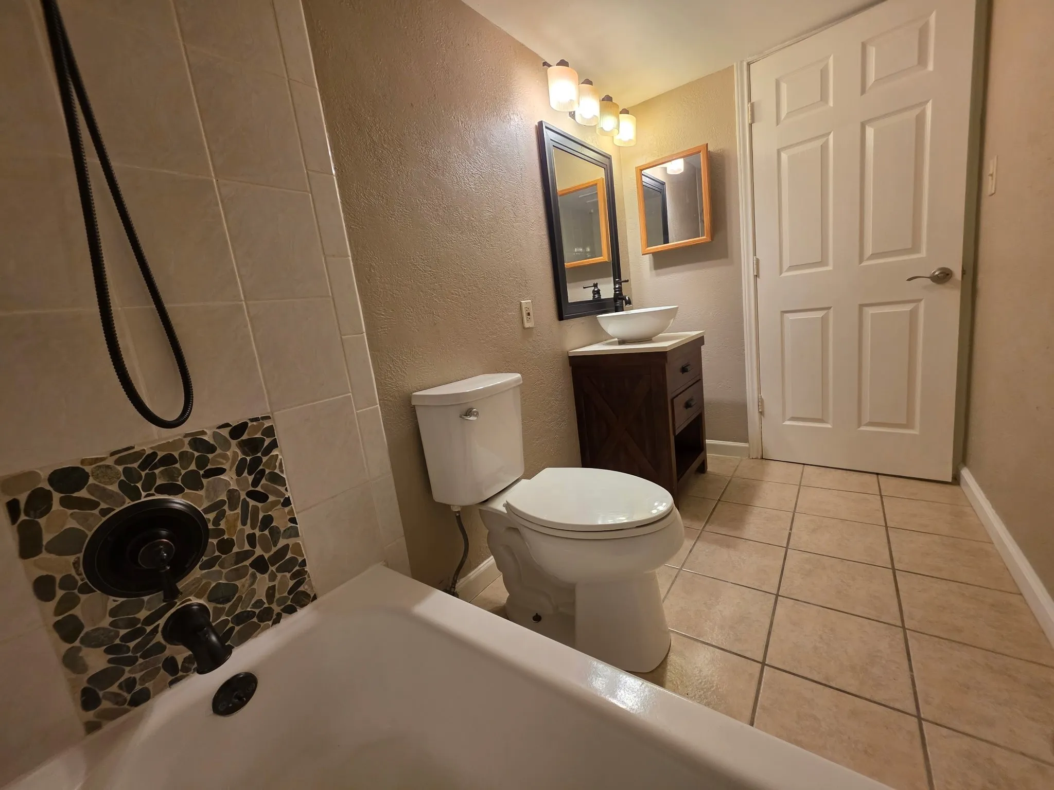 Updated bathroom with shower tub combo