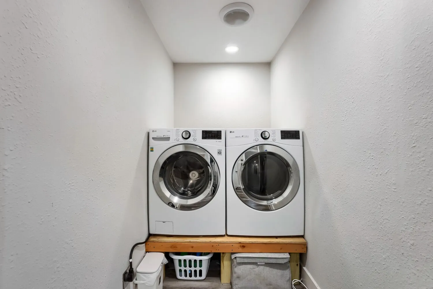 Recessed ceiling lighting and a ceiling-mounted exhaust fan